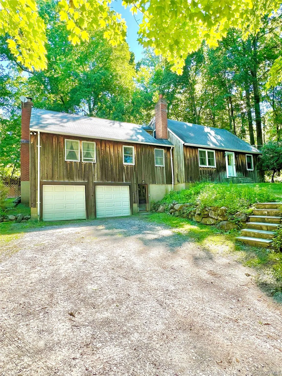 Two-car garage and front entry. Two-car garage and front entry.