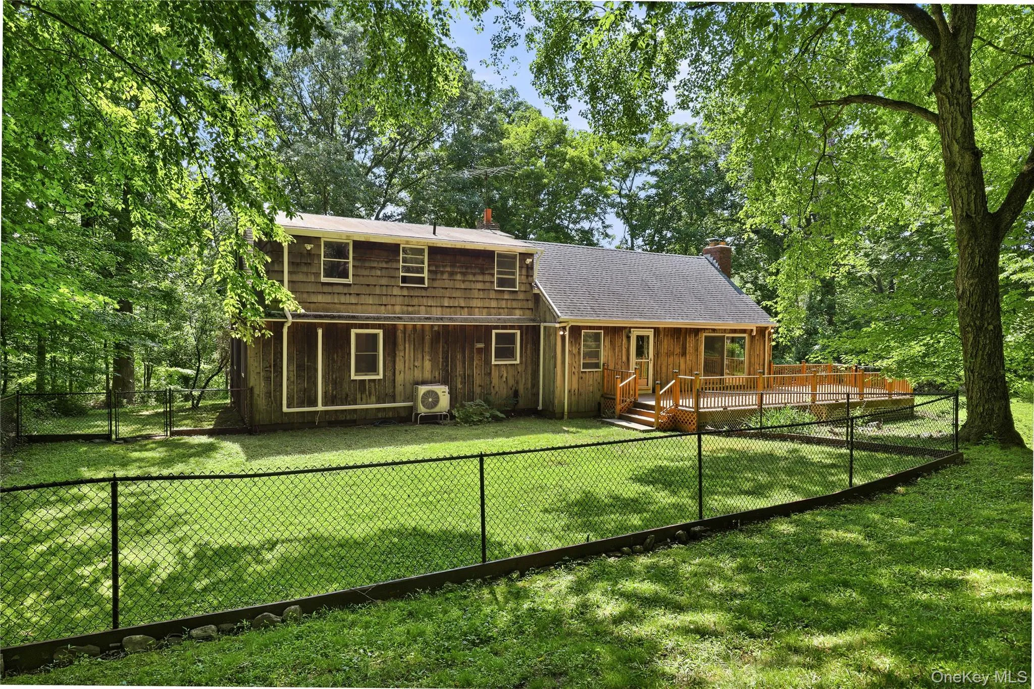 Showing dog run, deck, heat pump, dormer. Showing dog run, deck, heat pump, dormer.