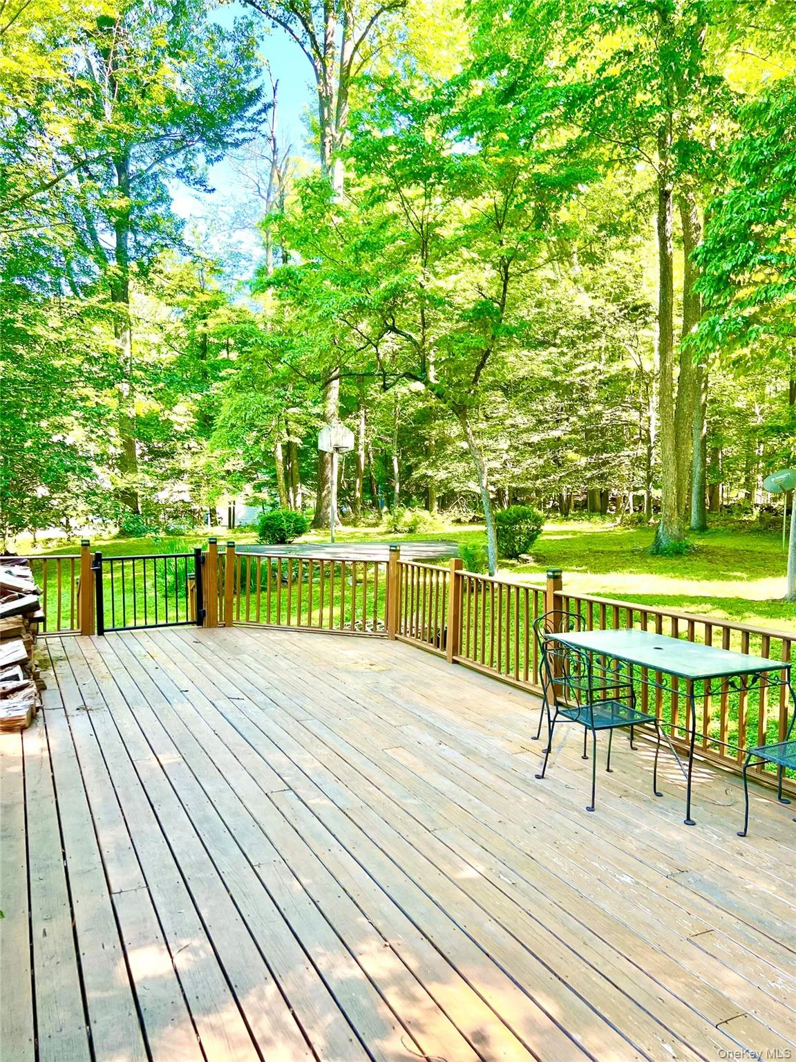 Large deck with a view of the yard. Large deck with a view of the yard.