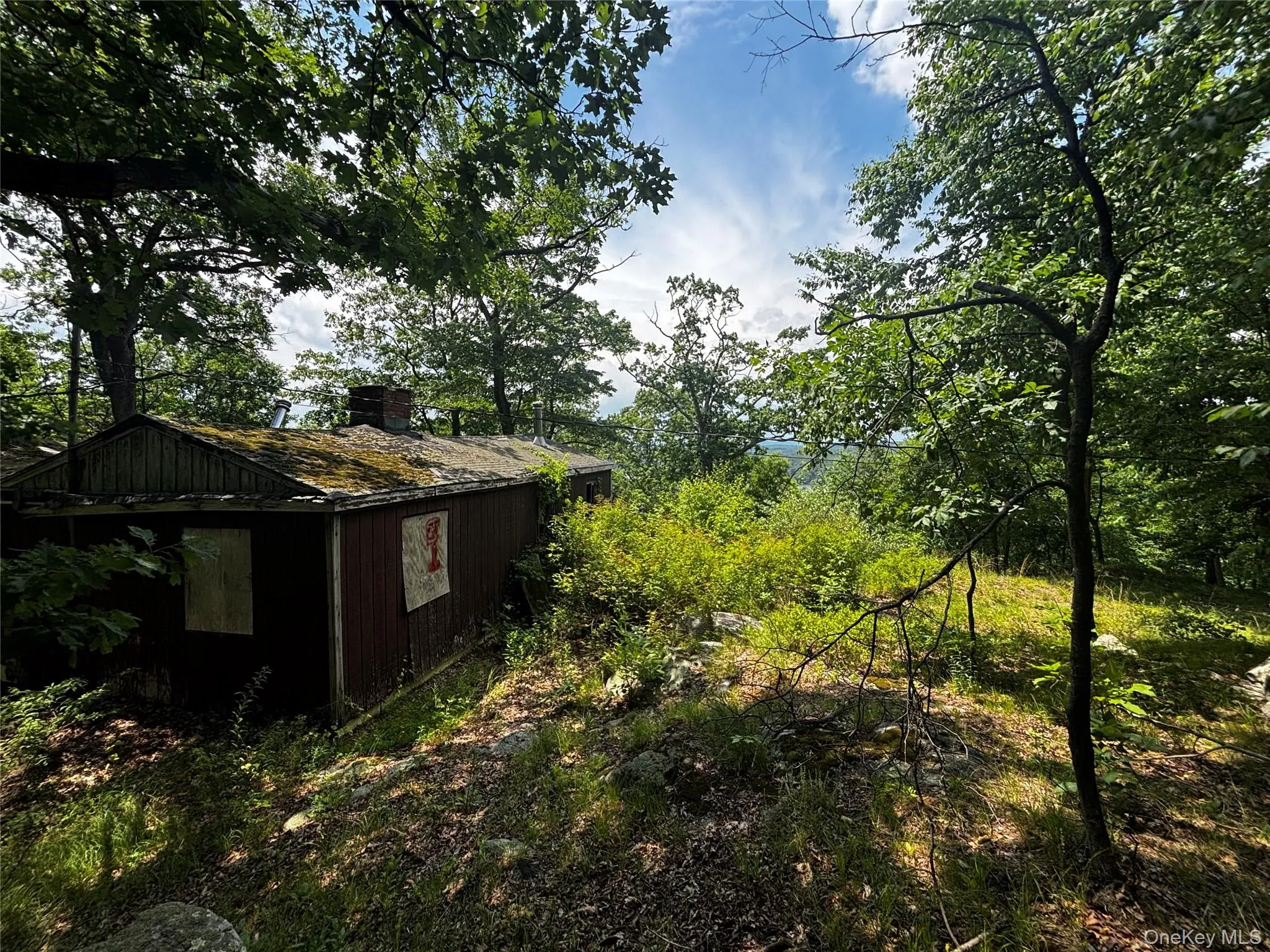 Up on a ledge above the cabin; a great spot for some chairs and fire pit! Up on a ledge above the cabin; a great spot for some chairs and fire pit!