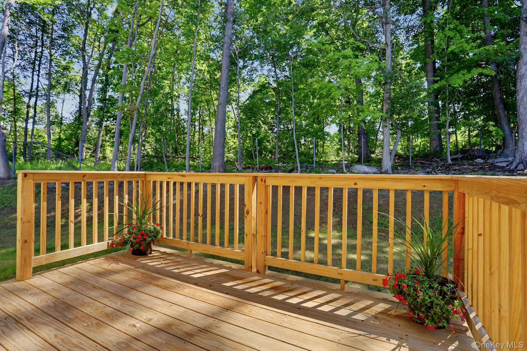 Back deck with access to yard Back deck with access to yard