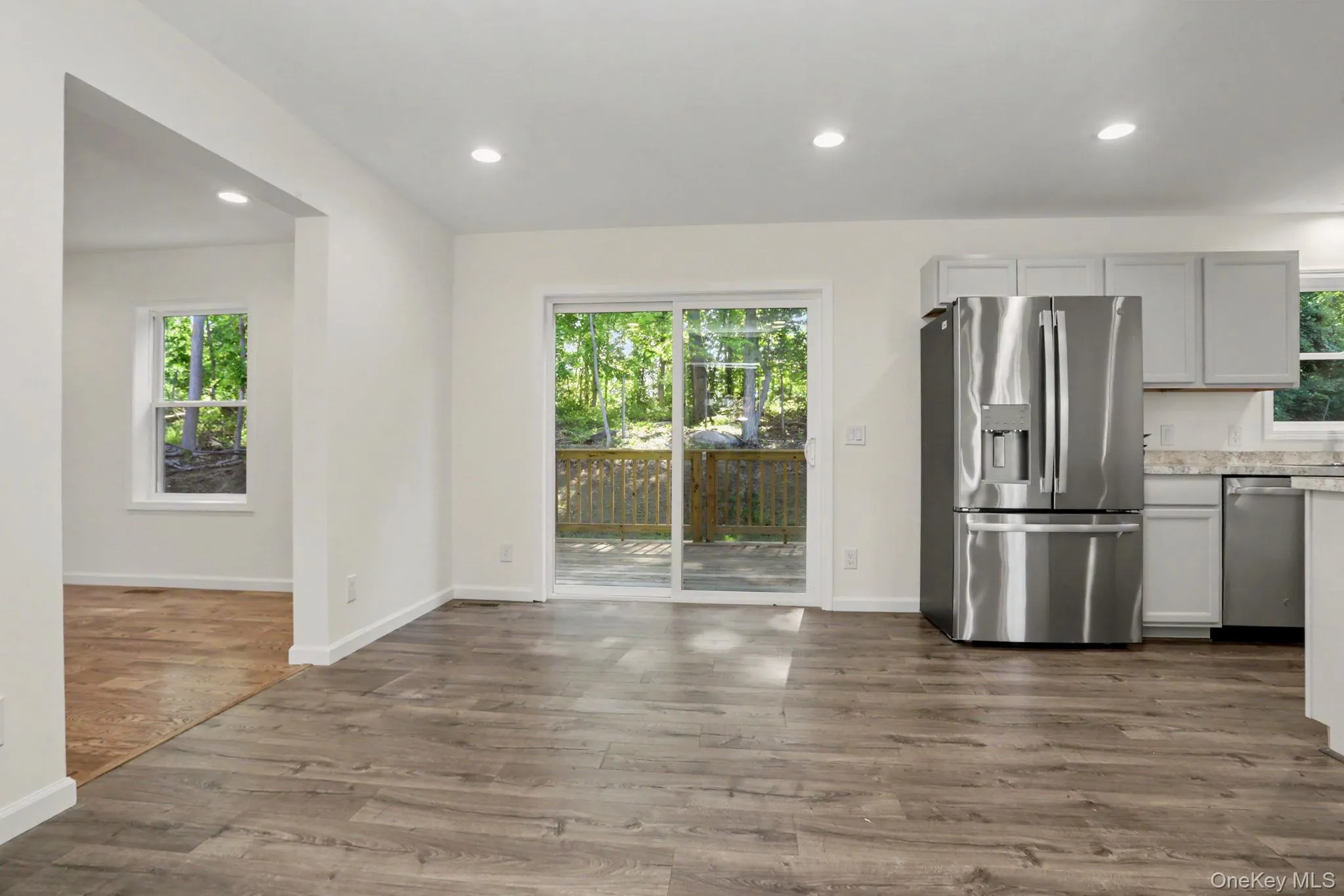 Eat-in kitchen with sliders out to back deck Eat-in kitchen with sliders out to back deck