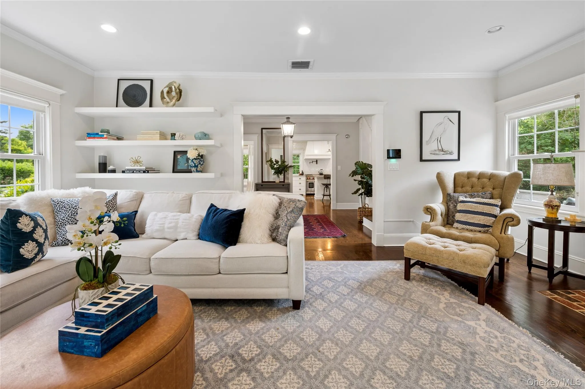 Custom cabinetry and shelving in this functional and large living room Custom cabinetry and shelving in this functional and large living room