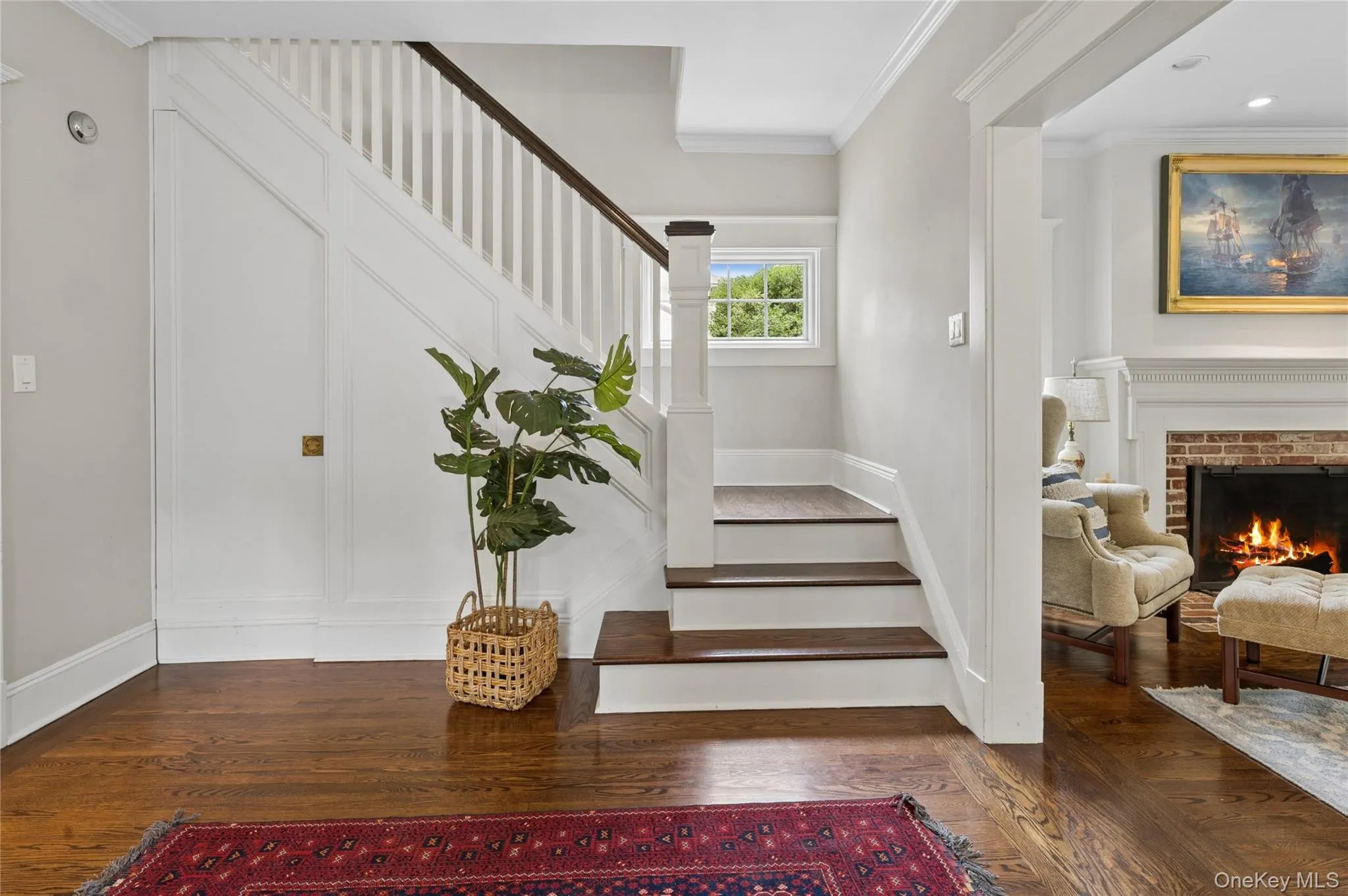 Notice the hidden door under the stairs that leads to the lower level. Notice the hidden door under the stairs that leads to the lower level.