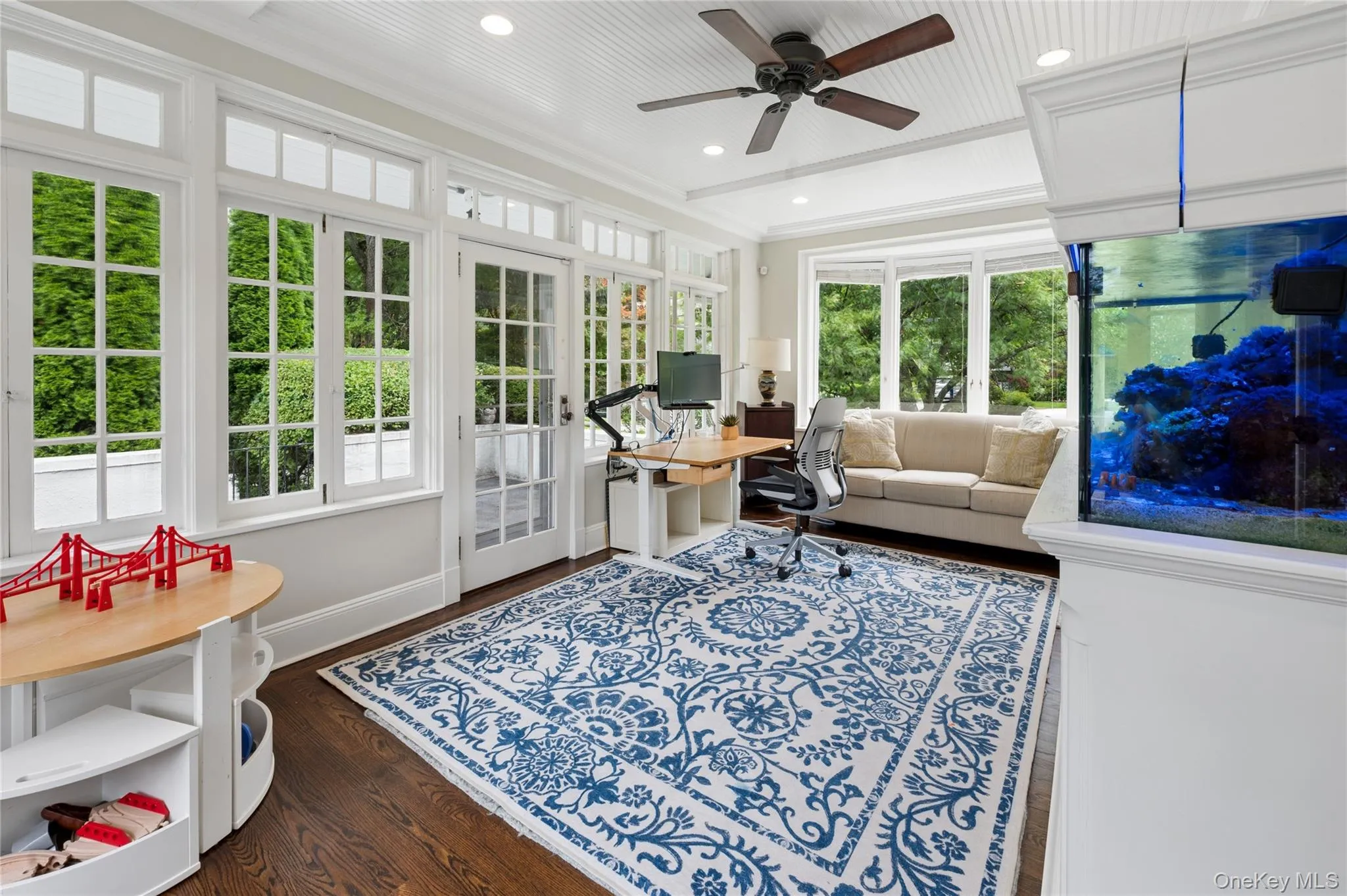 Easy access to the gated second patio through these sunroom doors. Easy access to the gated second patio through these sunroom doors.