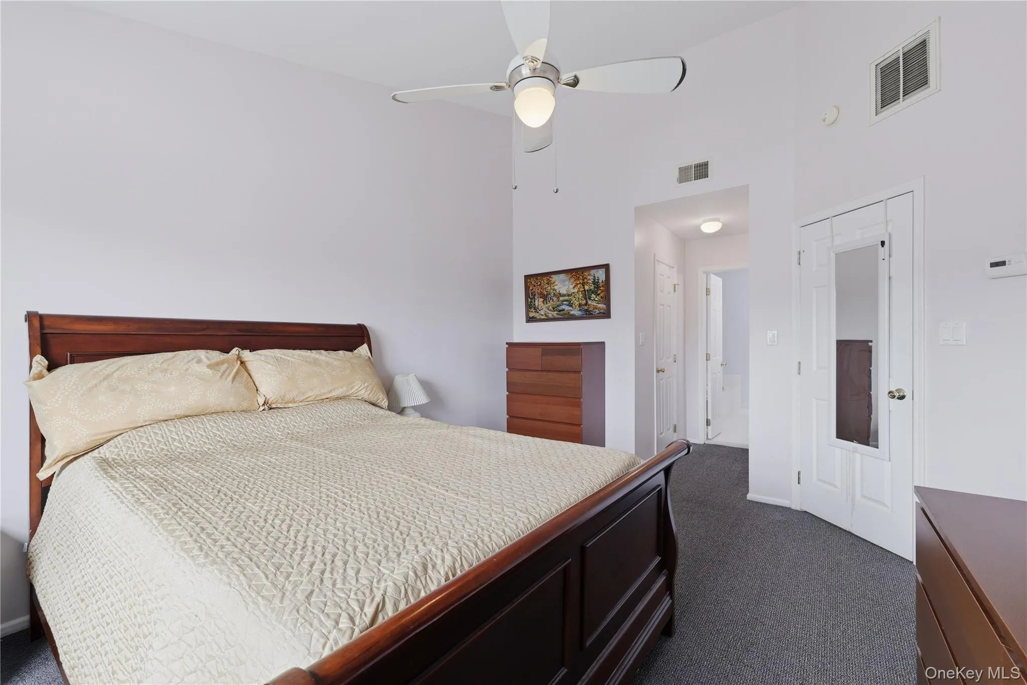 Primary bedroom featuring ensuite bathroom Primary bedroom featuring ensuite bathroom