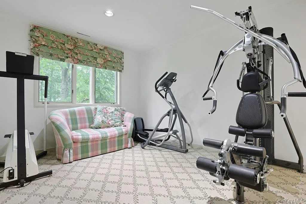 Primary suite-sitting area/ exercise room Primary suite-sitting area/ exercise room