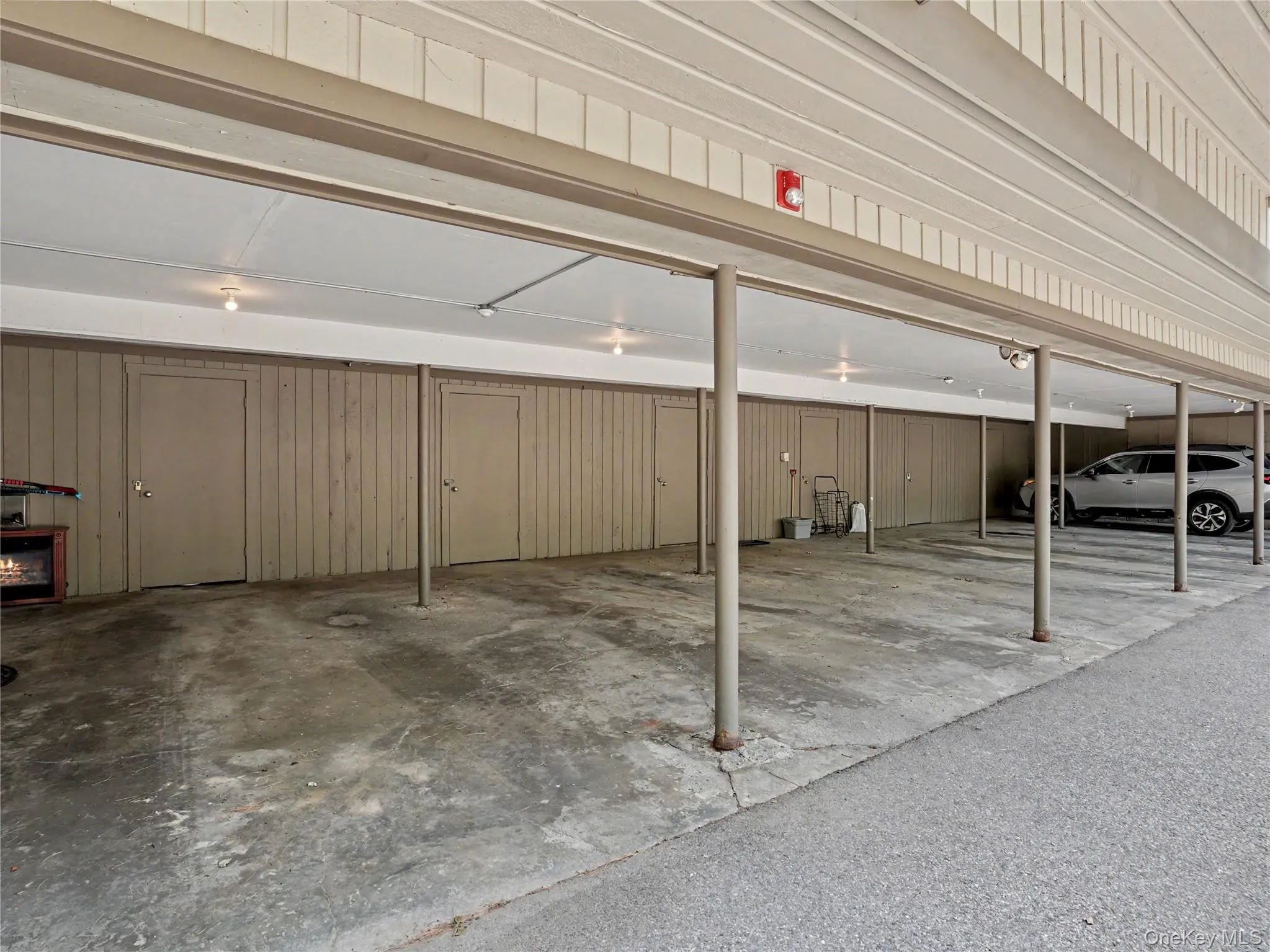 Dedicated carport with storage closet in the back (water heater is inside this closet) Dedicated carport with storage closet in the back (water heater is inside this closet)