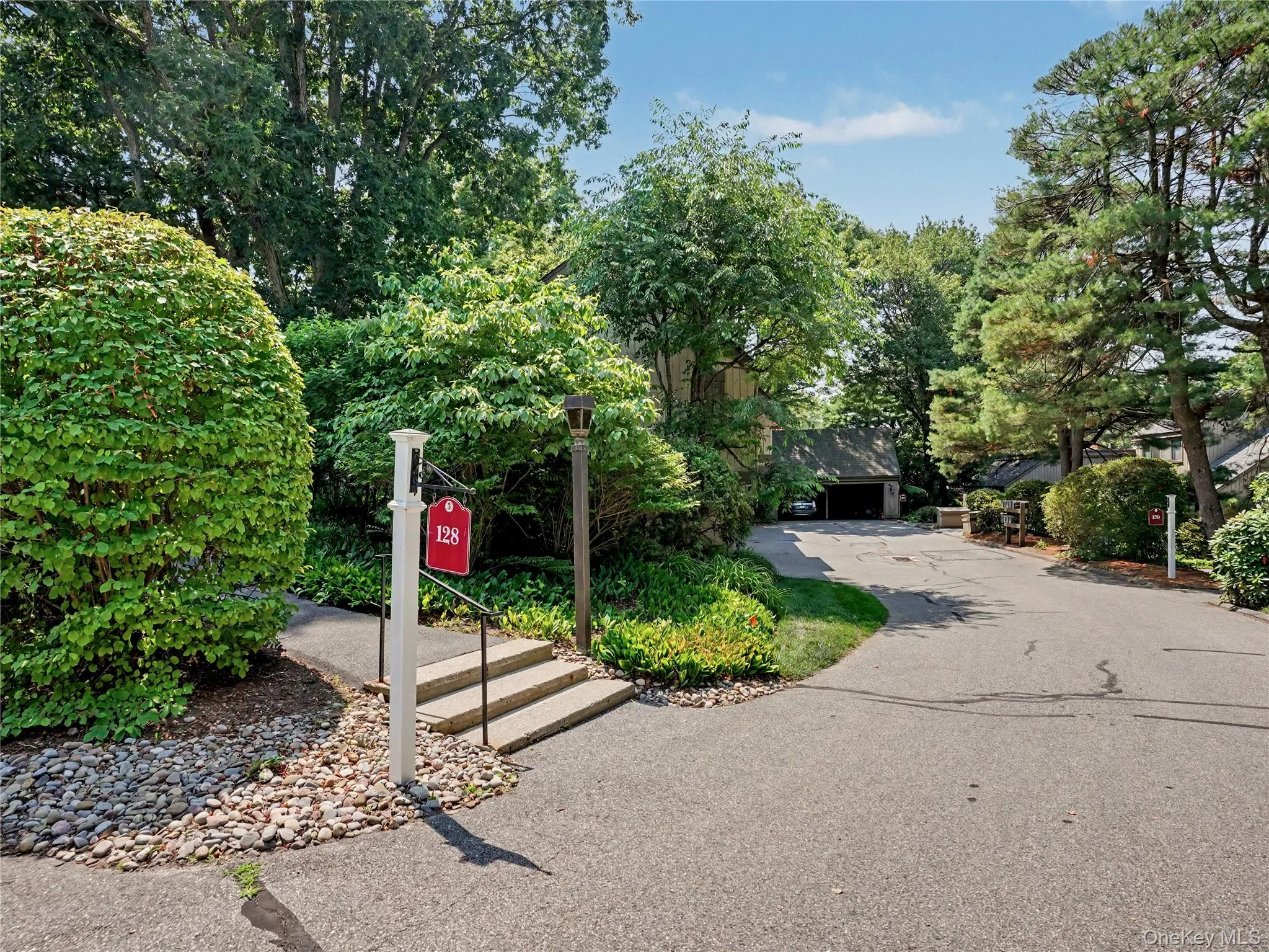Walkway to the unit is up 3 steps from the ground level. Walkway to the unit is up 3 steps from the ground level.