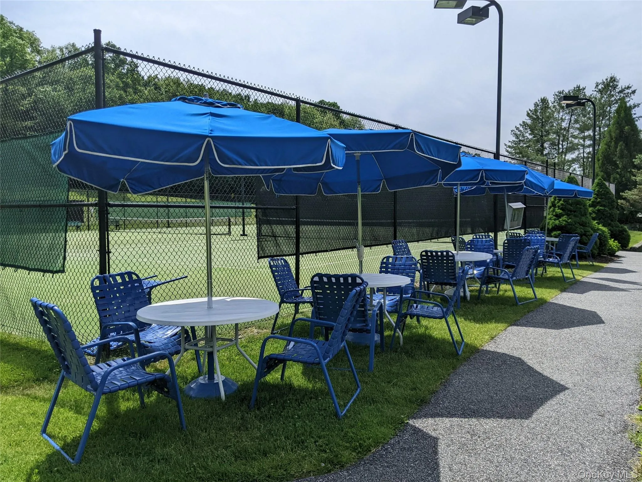 Spectator Tables at a Tennis Court Spectator Tables at a Tennis Court