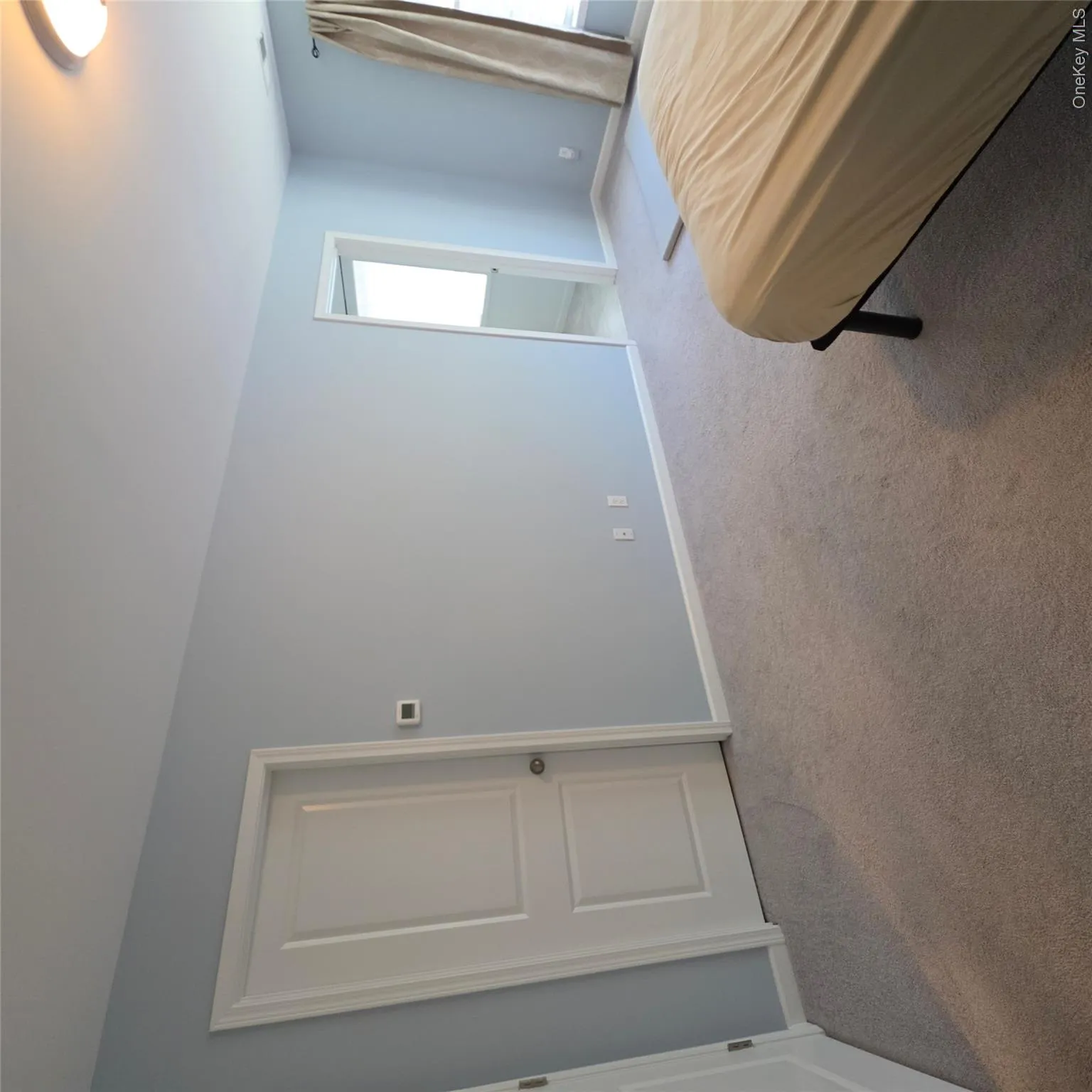 Walk-in Closet Door on left, Bathroom Door on right Walk-in Closet Door on left, Bathroom Door on right