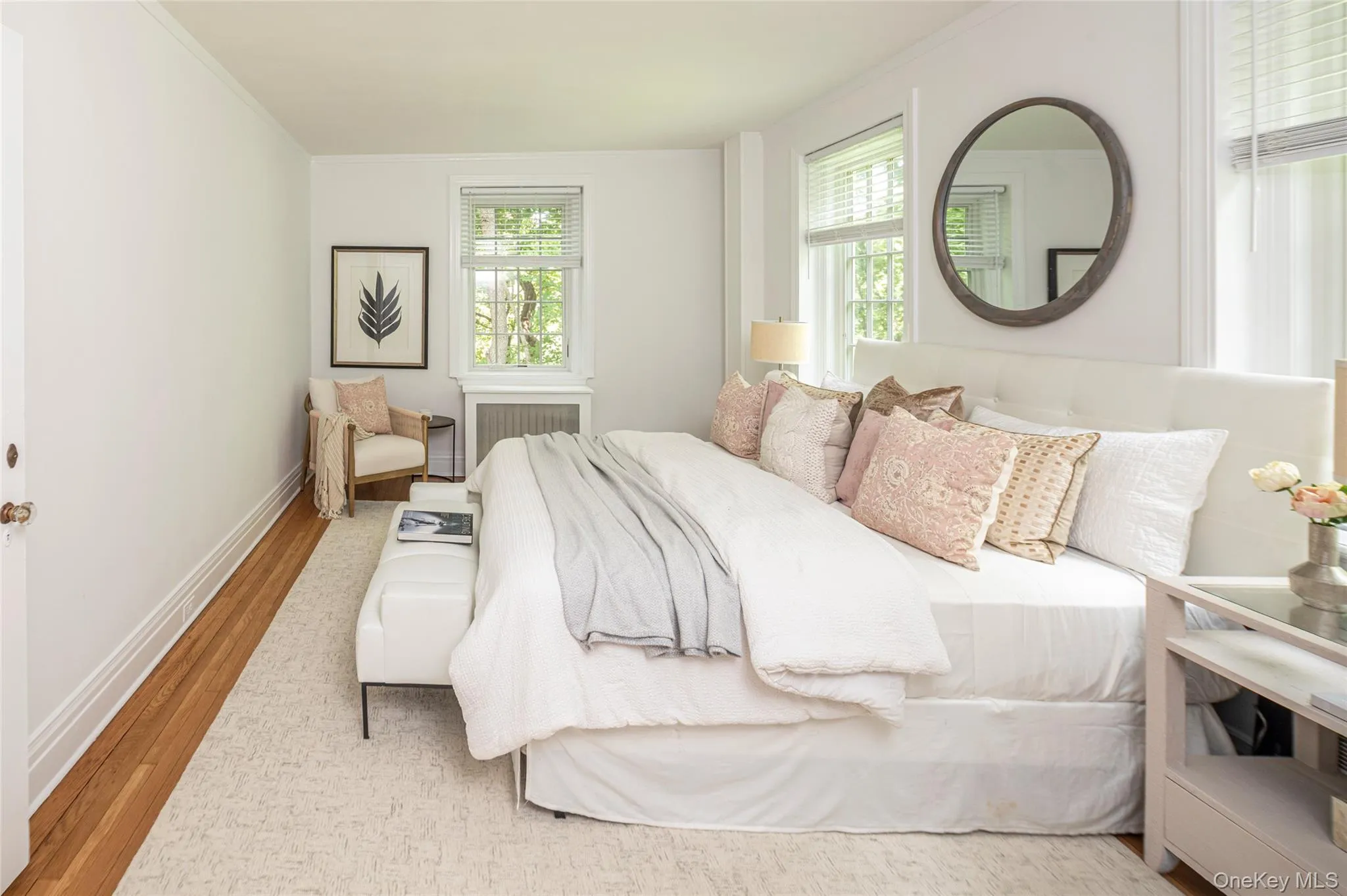 Large primary bedroom with lake views Large primary bedroom with lake views