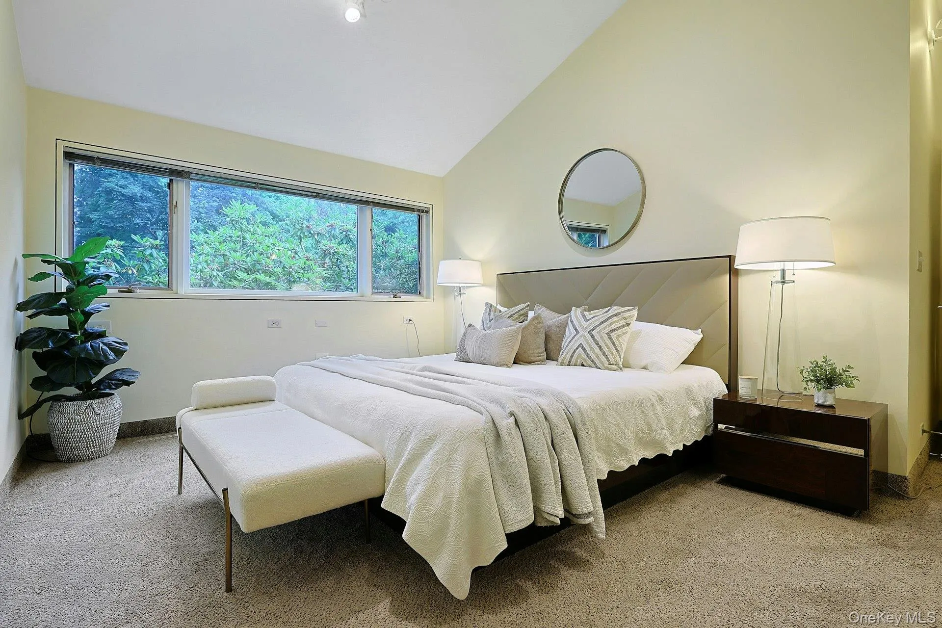 One of three generously sized bedrooms in the kids' wing, offering peaceful treetop views and ample closet space. One of three generously sized bedrooms in the kids' wing, offering peaceful treetop views and ample closet space.