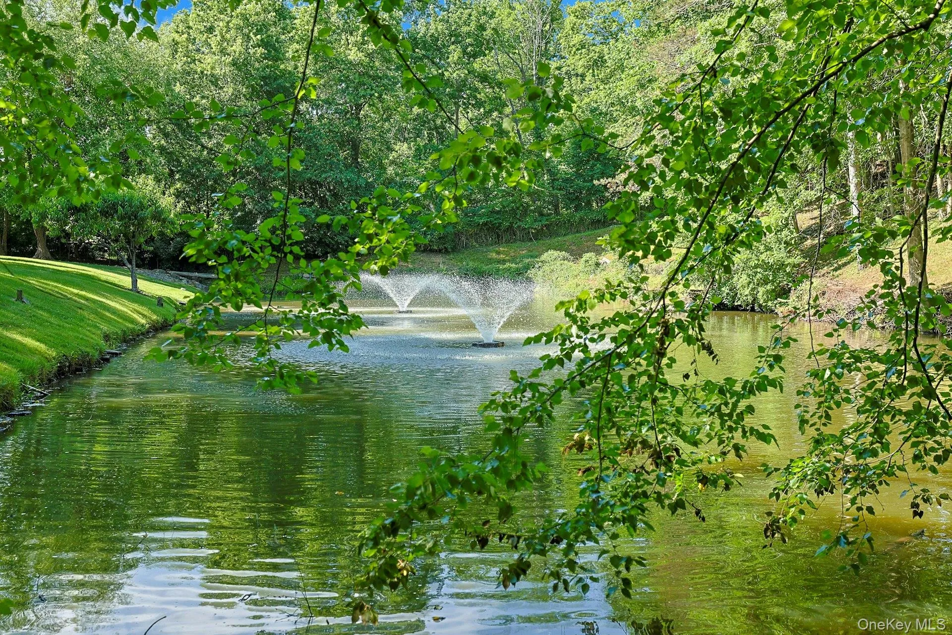 The extraordinary koi pond, home to hundreds of koi and turtles, serves as a breathtaking focal point of the estate. The extraordinary koi pond, home to hundreds of koi and turtles, serves as a breathtaking focal point of the estate.