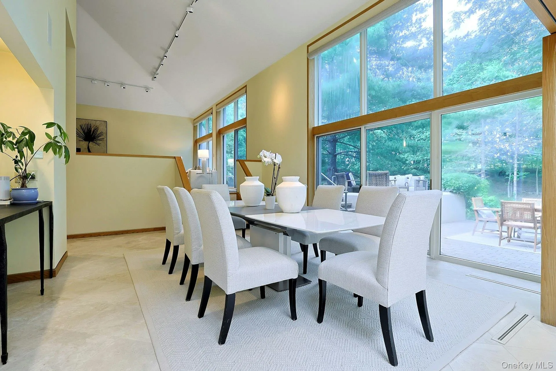Host memorable gatherings with seamless access between the dining room, patios, and breathtaking natural landscape. Host memorable gatherings with seamless access between the dining room, patios, and breathtaking natural landscape.