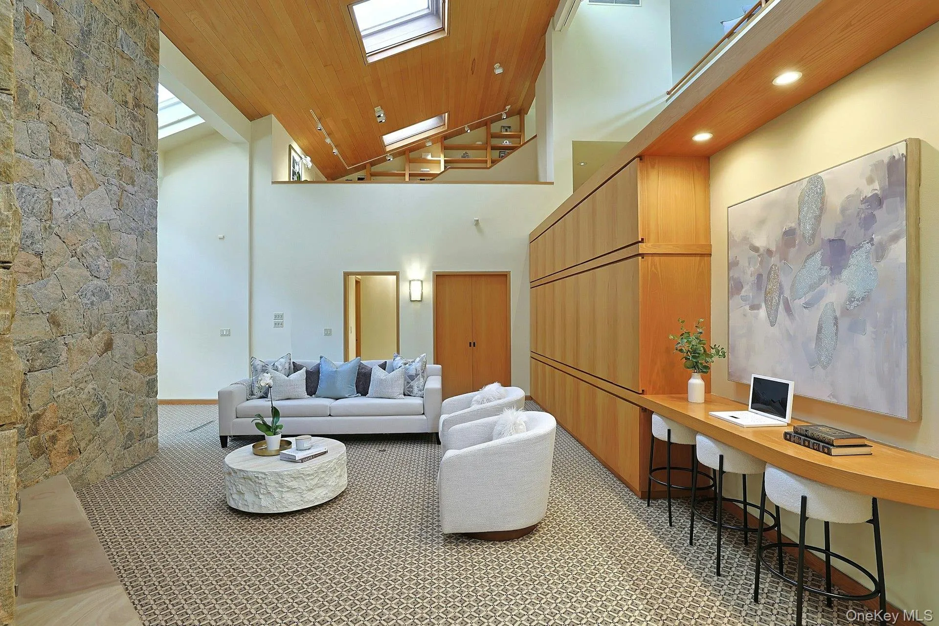 Architectural details and exceptional craftsmanship showcased in these clean lined built-ins define this one-of-a-kind contemporary residence. Full bath for pool use and large walk-in closet at the back of this photo. Architectural details and exceptional craftsmanship showcased in these clean lined built-ins define this one-of-a-kind contemporary residence. Full bath for pool use and large walk-in closet at the back of this photo.