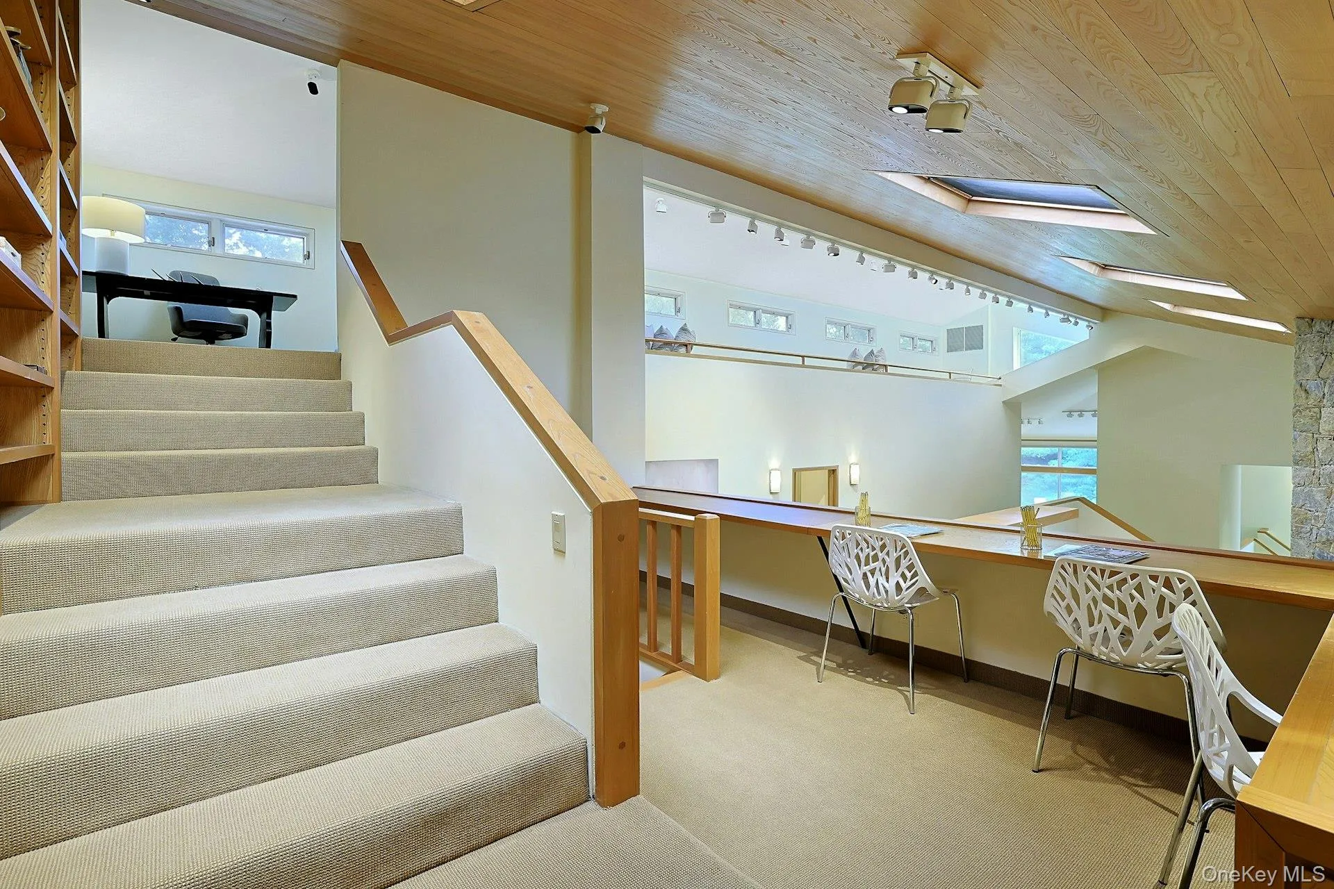 Overlooking the family room below, this open loft-style workspace offers the perfect setting for studying, working, or creative pursuits. Overlooking the family room below, this open loft-style workspace offers the perfect setting for studying, working, or creative pursuits.