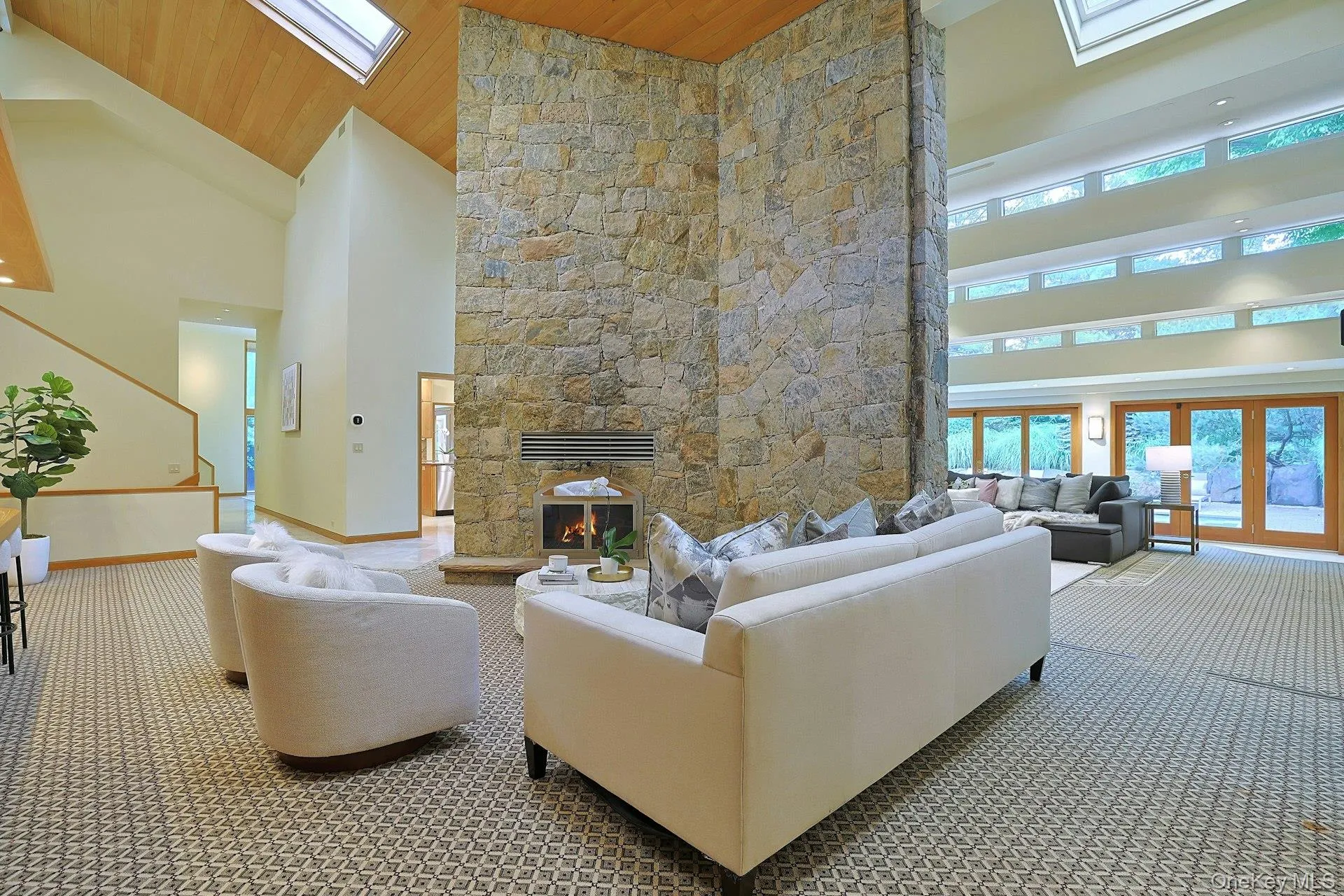 The open, connected floor plan provides multiple areas to gather for casual or more formal entertaining. The open, connected floor plan provides multiple areas to gather for casual or more formal entertaining.