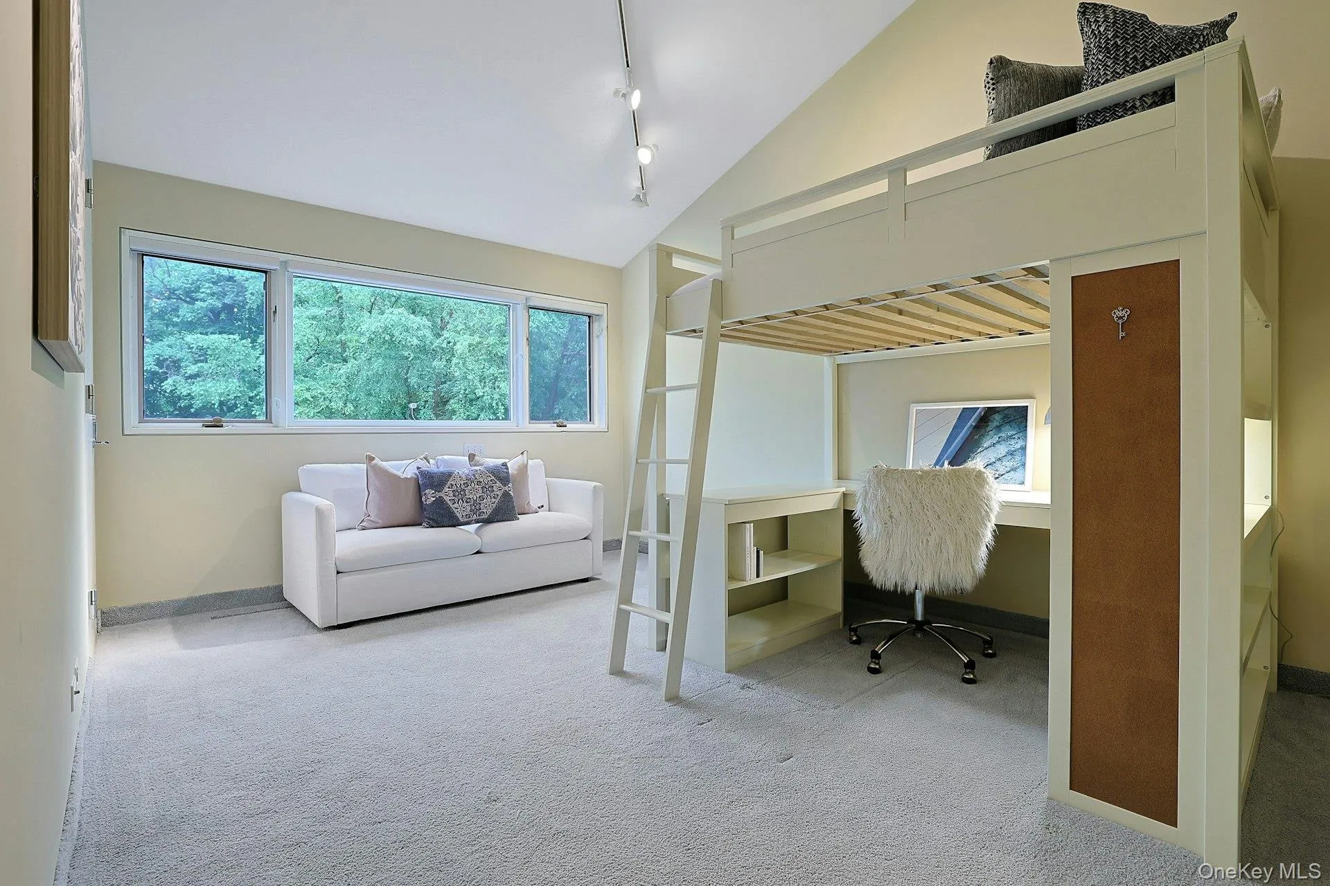 A bedroom with ensuite bath creates an ideal retreat with beautiful green views. A bedroom with ensuite bath creates an ideal retreat with beautiful green views.