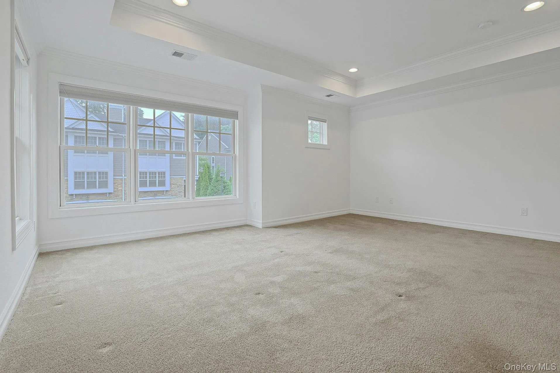Oversized windows and elegant architectural details create a bright and inviting atmosphere, while the generous proportions provide exceptional comfort and flexibility. Oversized windows and elegant architectural details create a bright and inviting atmosphere, while the generous proportions provide exceptional comfort and flexibility.