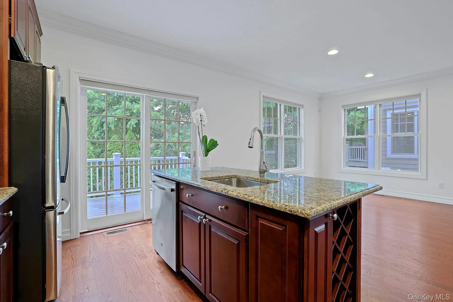 Thoughtfully designed for today's lifestyle, the kitchen enjoys easy sightlines to both the dining and living areas. Thoughtfully designed for today's lifestyle, the kitchen enjoys easy sightlines to both the dining and living areas.