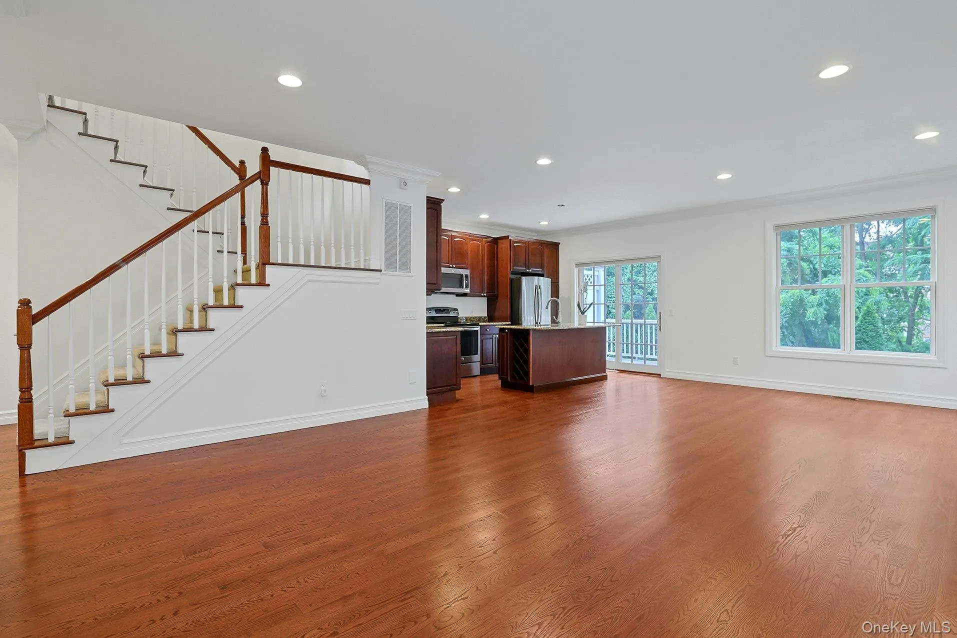 This is the same photo without the digital staging and you can see the generous proportions of the room. This is the same photo without the digital staging and you can see the generous proportions of the room.