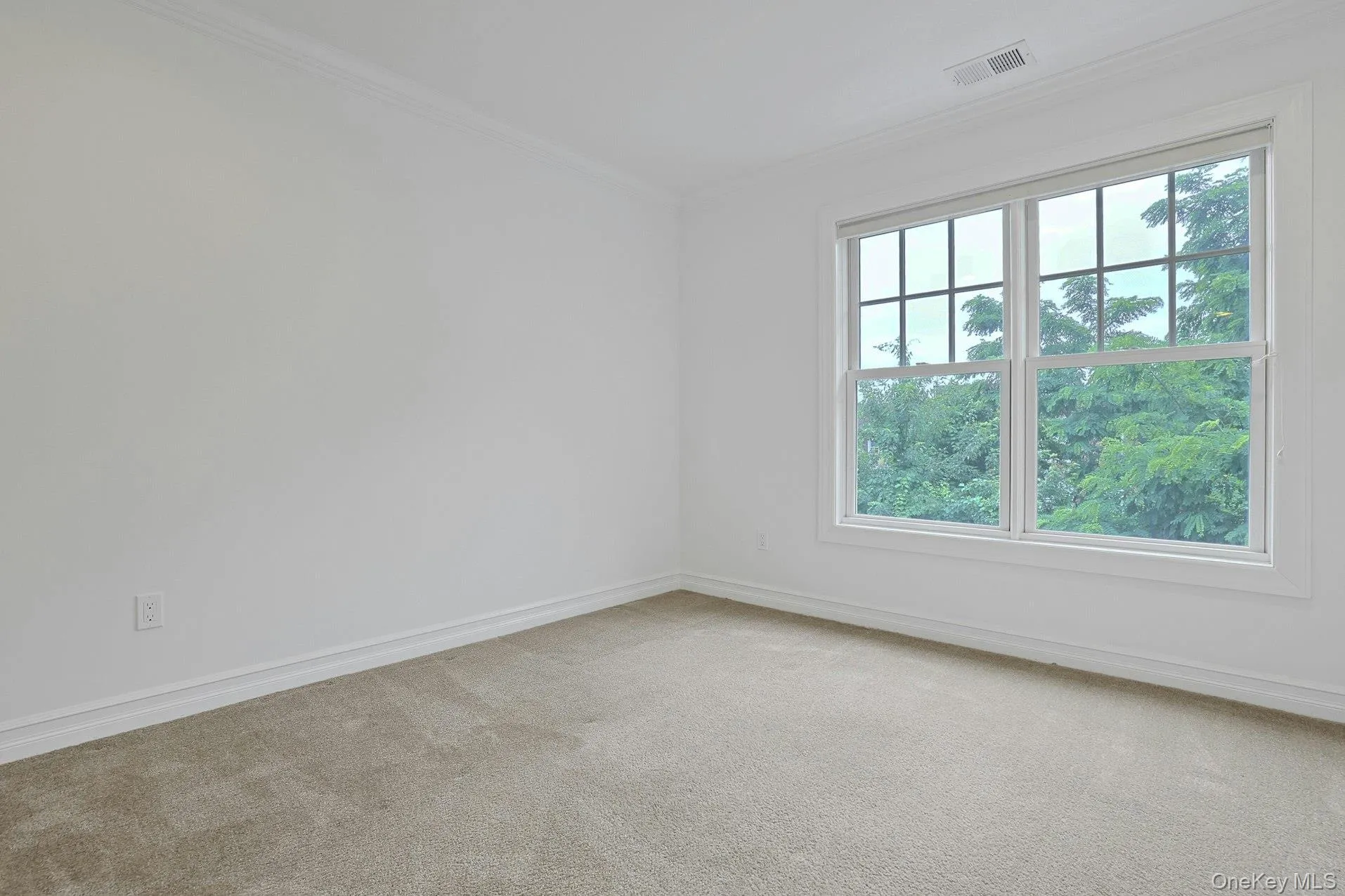 Filled with natural light and overlooking mature greenery, this well-proportioned bedroom offers a peaceful setting and ample space for furnishings. Filled with natural light and overlooking mature greenery, this well-proportioned bedroom offers a peaceful setting and ample space for furnishings.