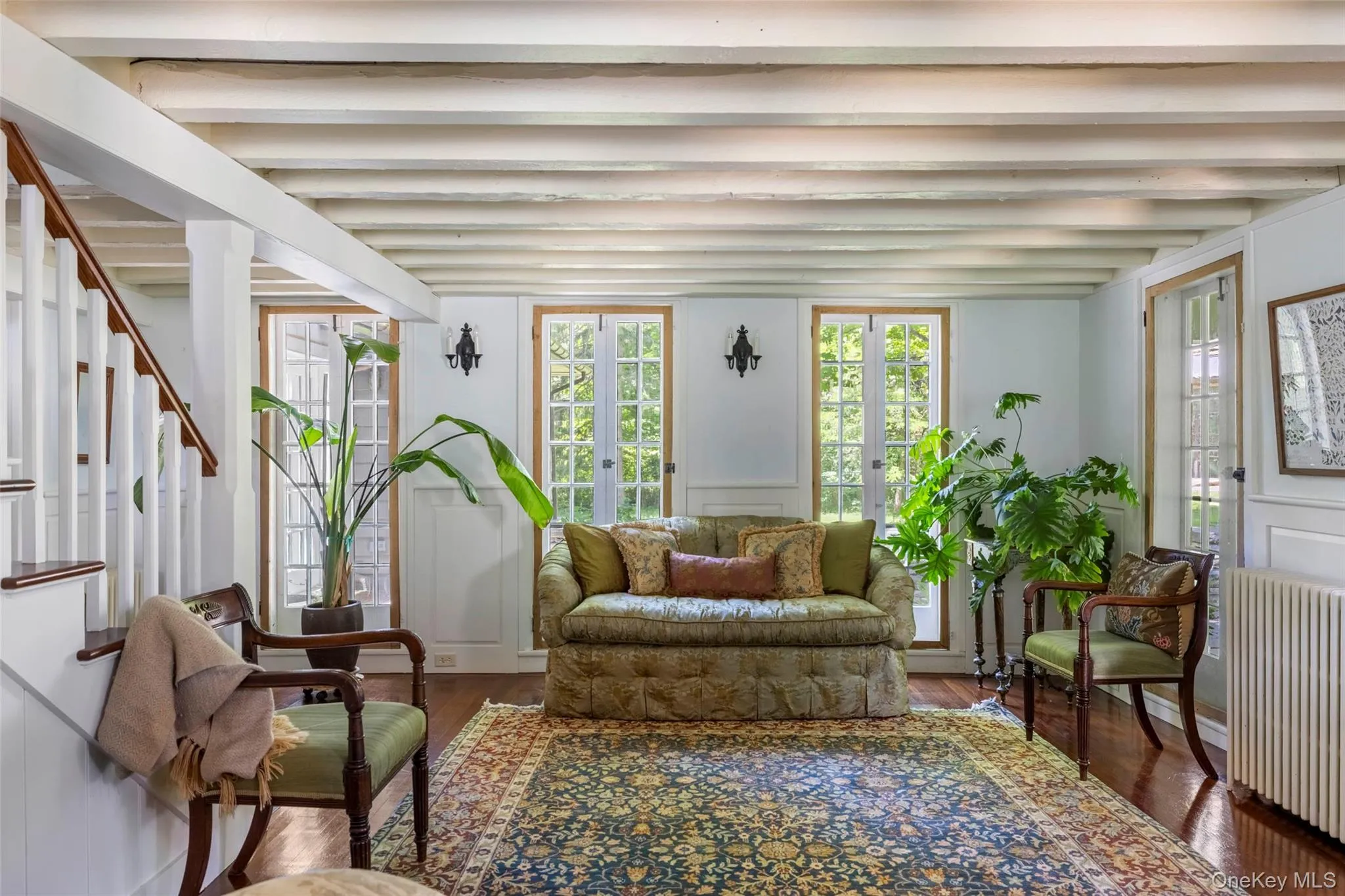 Surrounded by French doors opening to the gardens Surrounded by French doors opening to the gardens