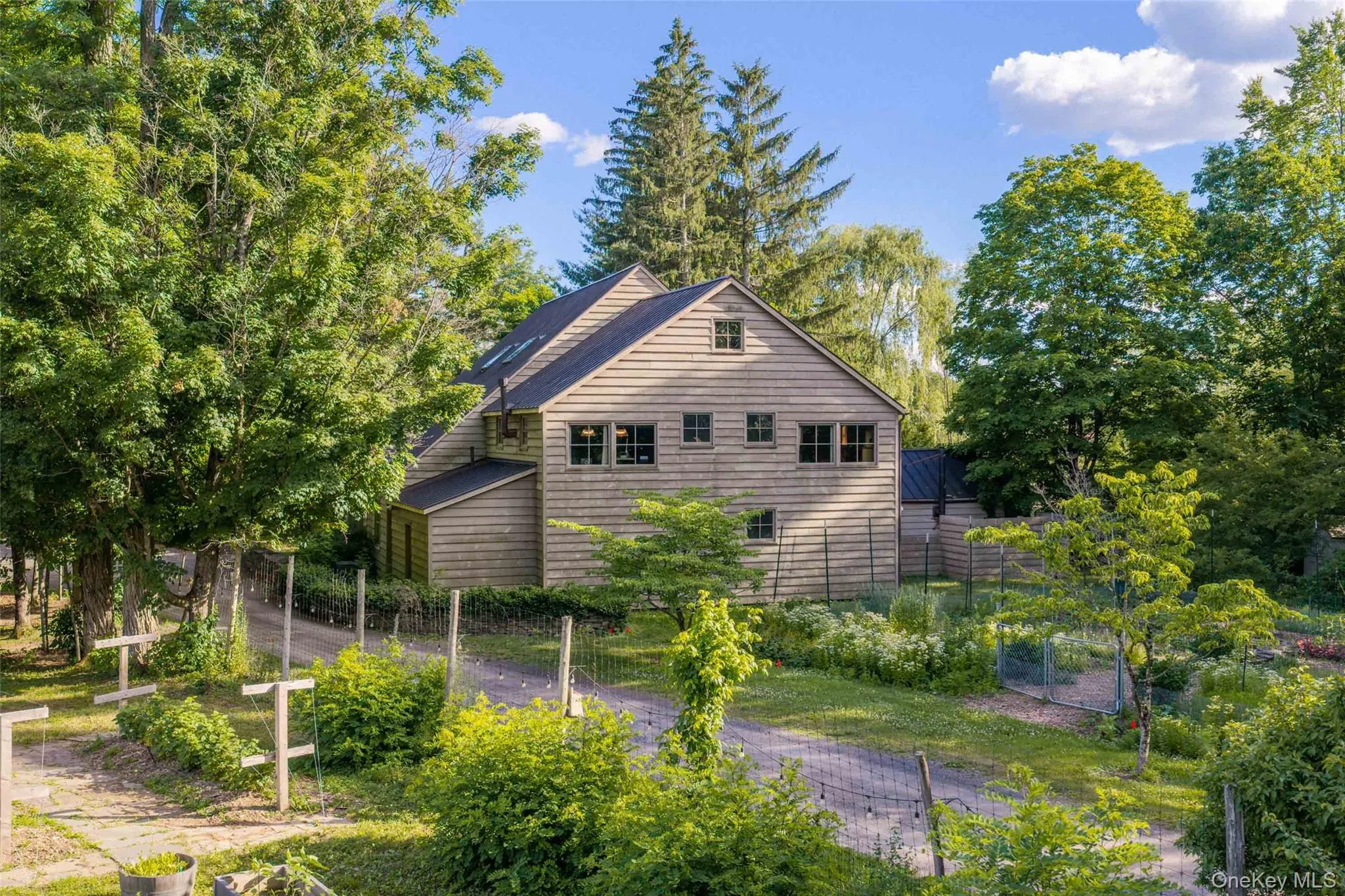 The Broken Wing Barn is nestled among abundant perennial gardens, where seasonal blooms can be gathered for fresh arrangements indoors The Broken Wing Barn is nestled among abundant perennial gardens, where seasonal blooms can be gathered for fresh arrangements indoors