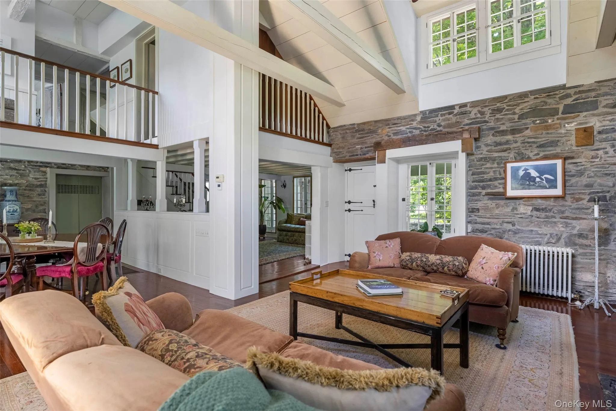 A dramatic living space with exceptional volume and timeless architectural character A dramatic living space with exceptional volume and timeless architectural character
