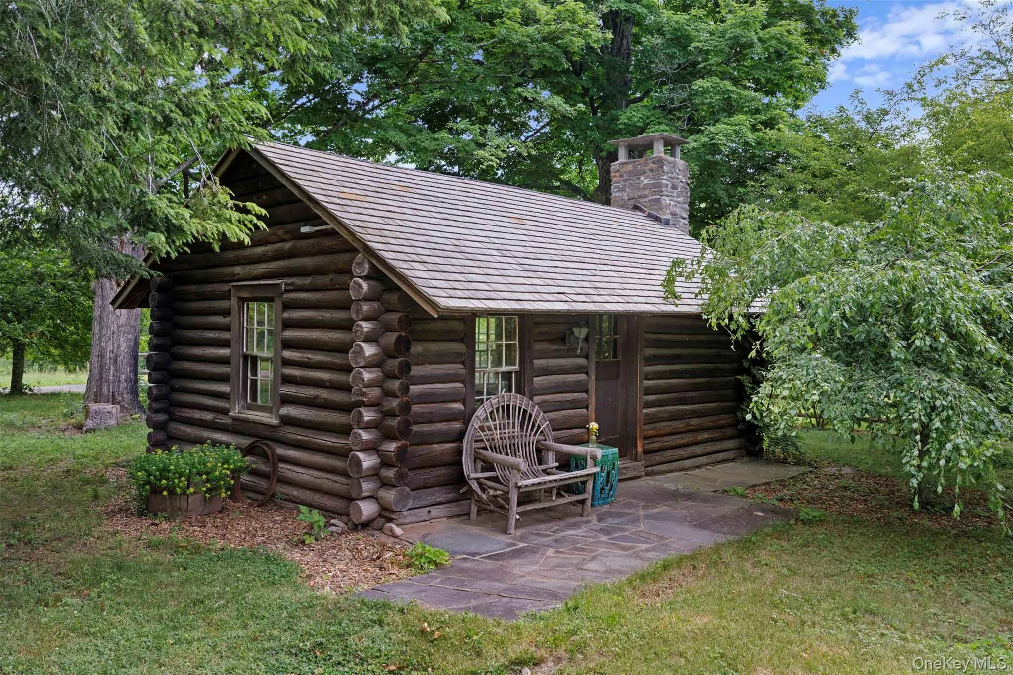 Authentic log cabin interior showcasing original timber construction and period character Authentic log cabin interior showcasing original timber construction and period character