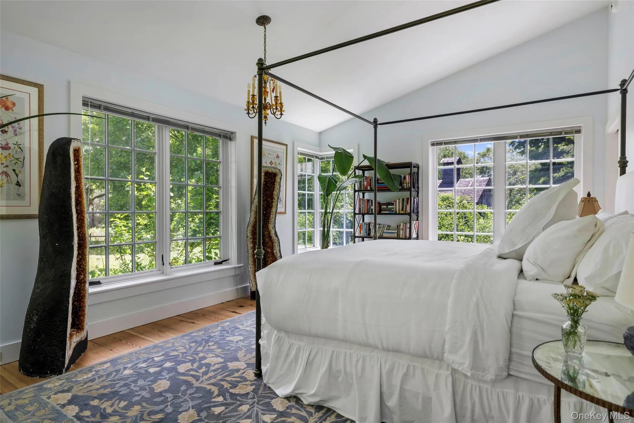 Vaulted ceiling with dual-aspect windows overlooking the gardens Vaulted ceiling with dual-aspect windows overlooking the gardens