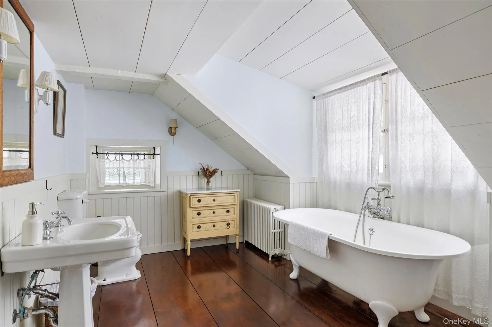 Charming upstairs bathroom with classic clawfoot soaking tub Charming upstairs bathroom with classic clawfoot soaking tub
