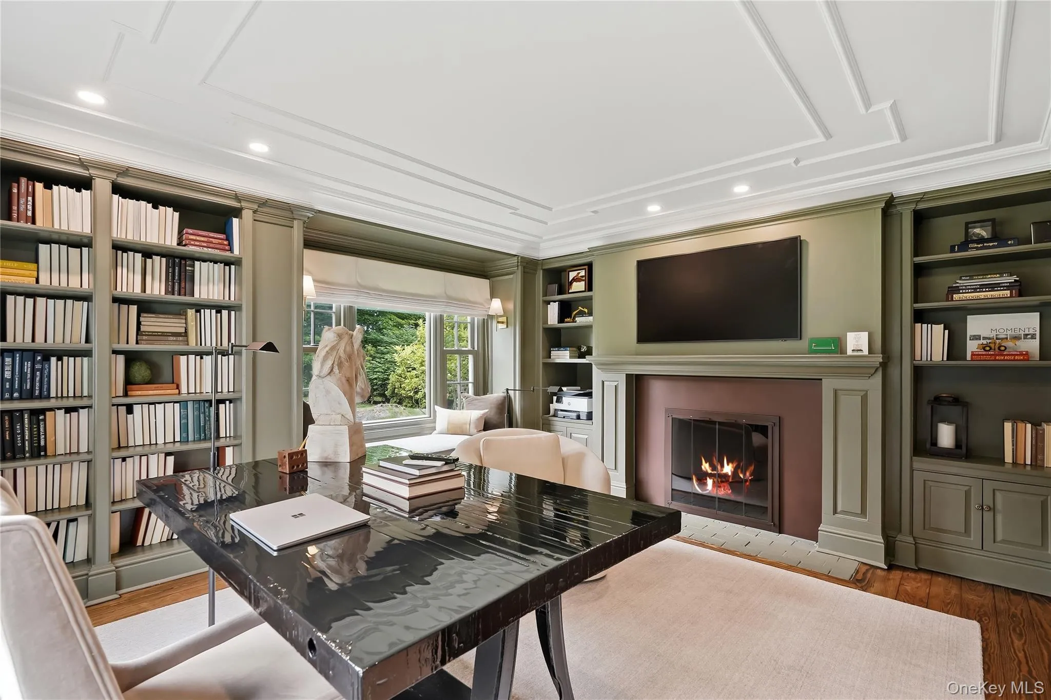 First floor office with wood burning fireplace First floor office with wood burning fireplace