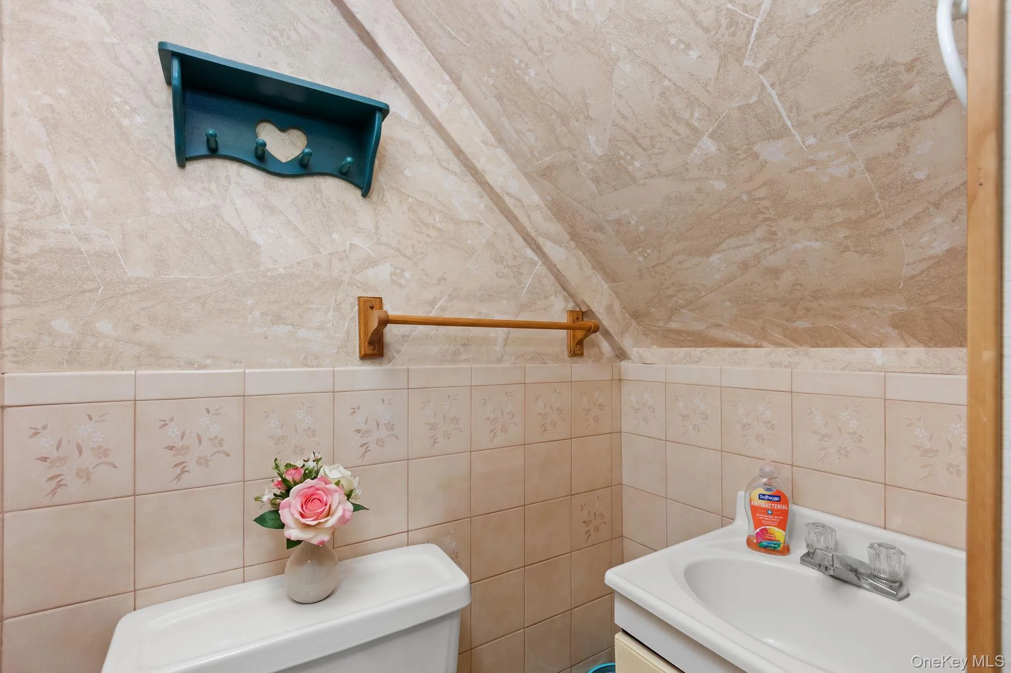 Half bathroom located in finished basement. Half bathroom located in finished basement.