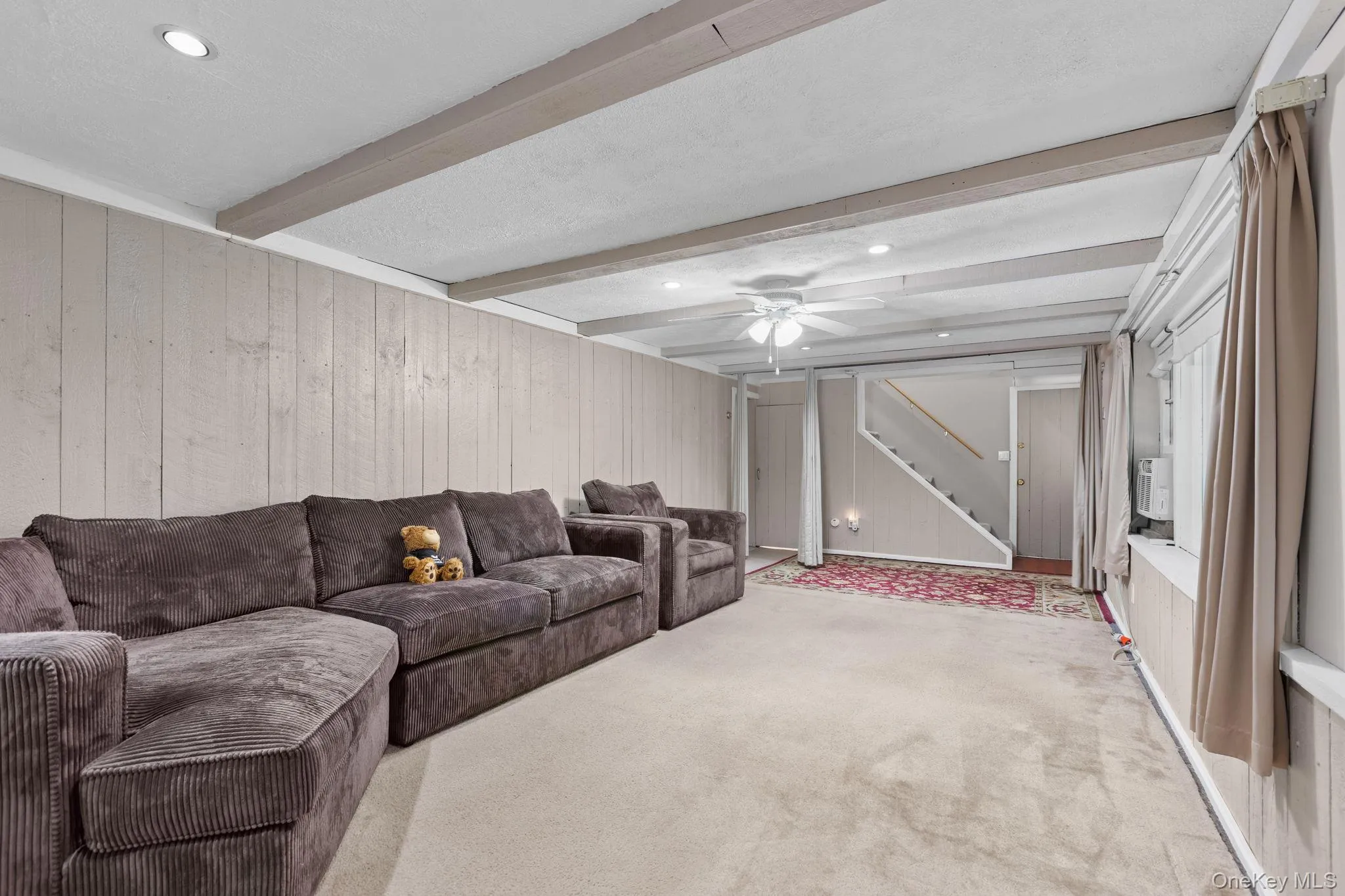 Spacious finished basement with carpet. Spacious finished basement with carpet.
