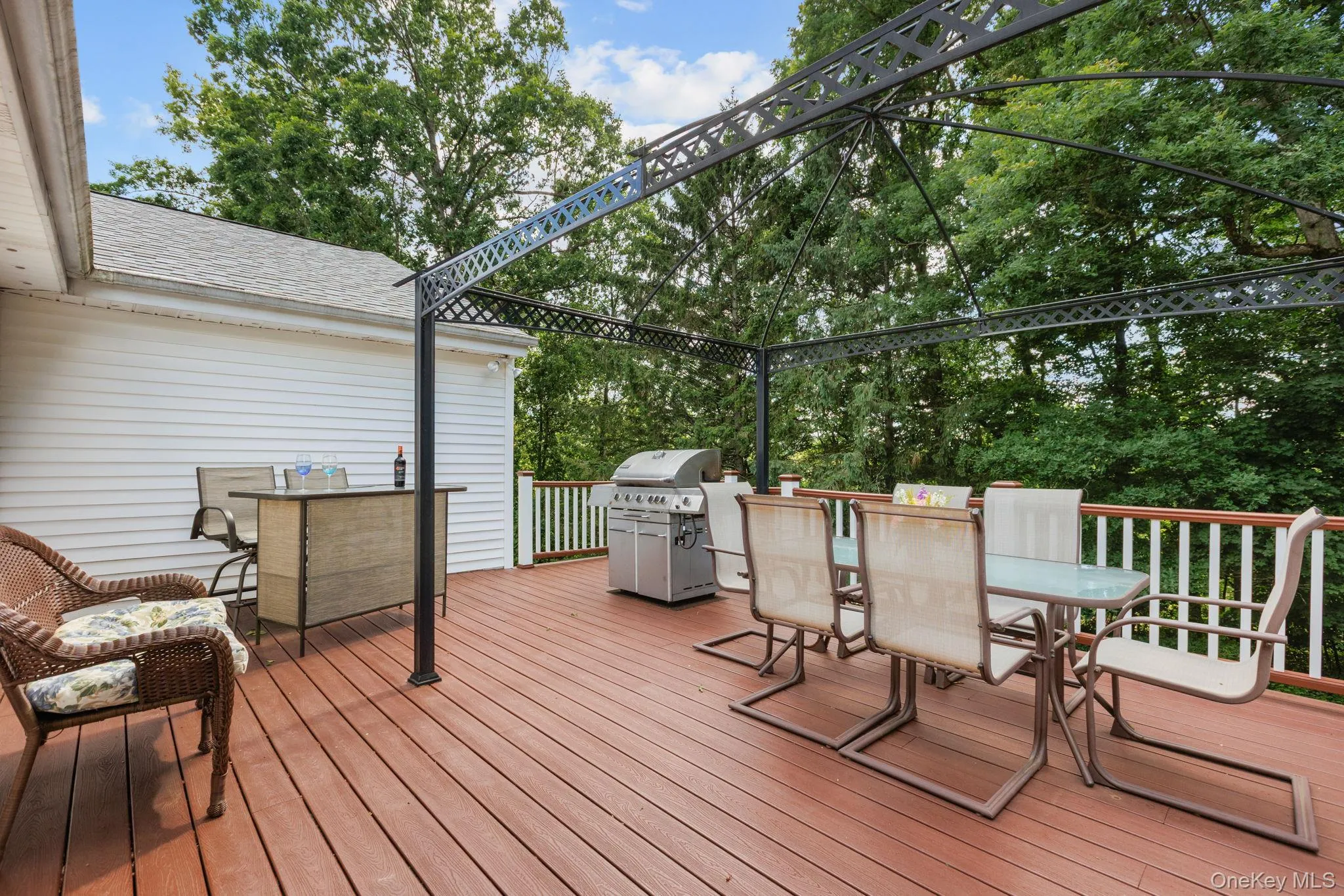 Raised deck with room for gazebo, patio furniture and bar for entertainment. Raised deck with room for gazebo, patio furniture and bar for entertainment.