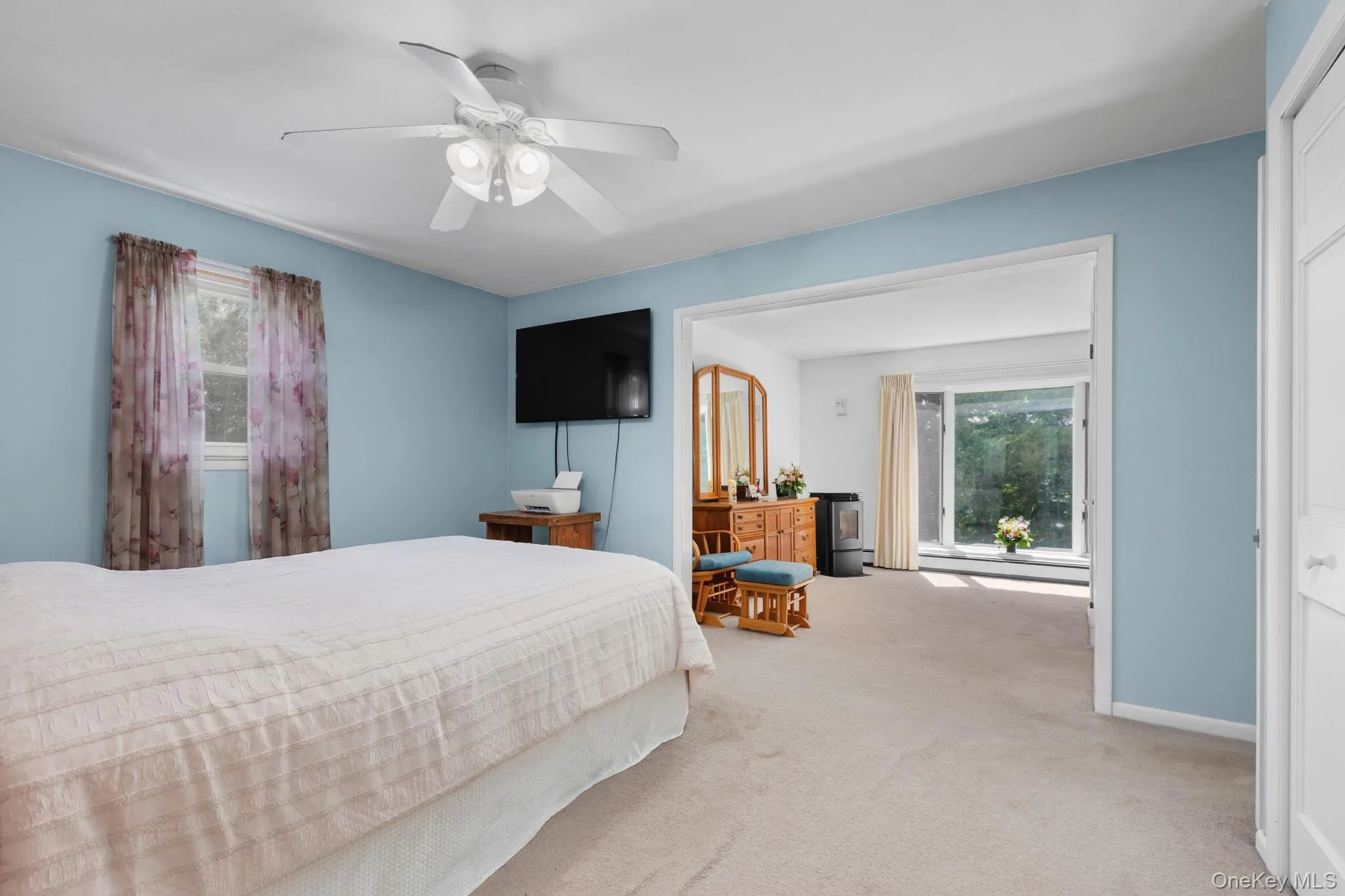 Primary bedroom with an adjoining sitting room, an abundance of closet space and en-suite bathroom. Primary bedroom with an adjoining sitting room, an abundance of closet space and en-suite bathroom.