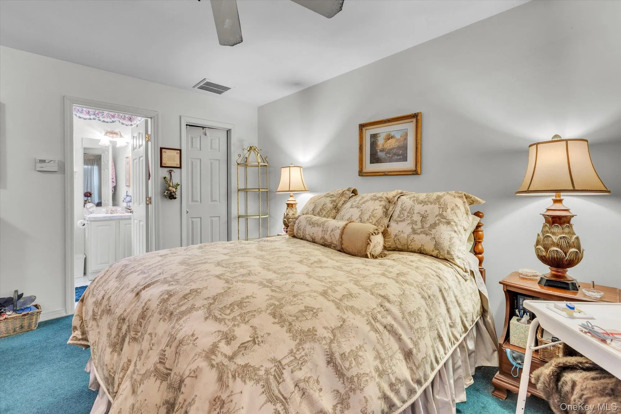 Bedroom on upper level with attached bathroom. Bedroom on upper level with attached bathroom.