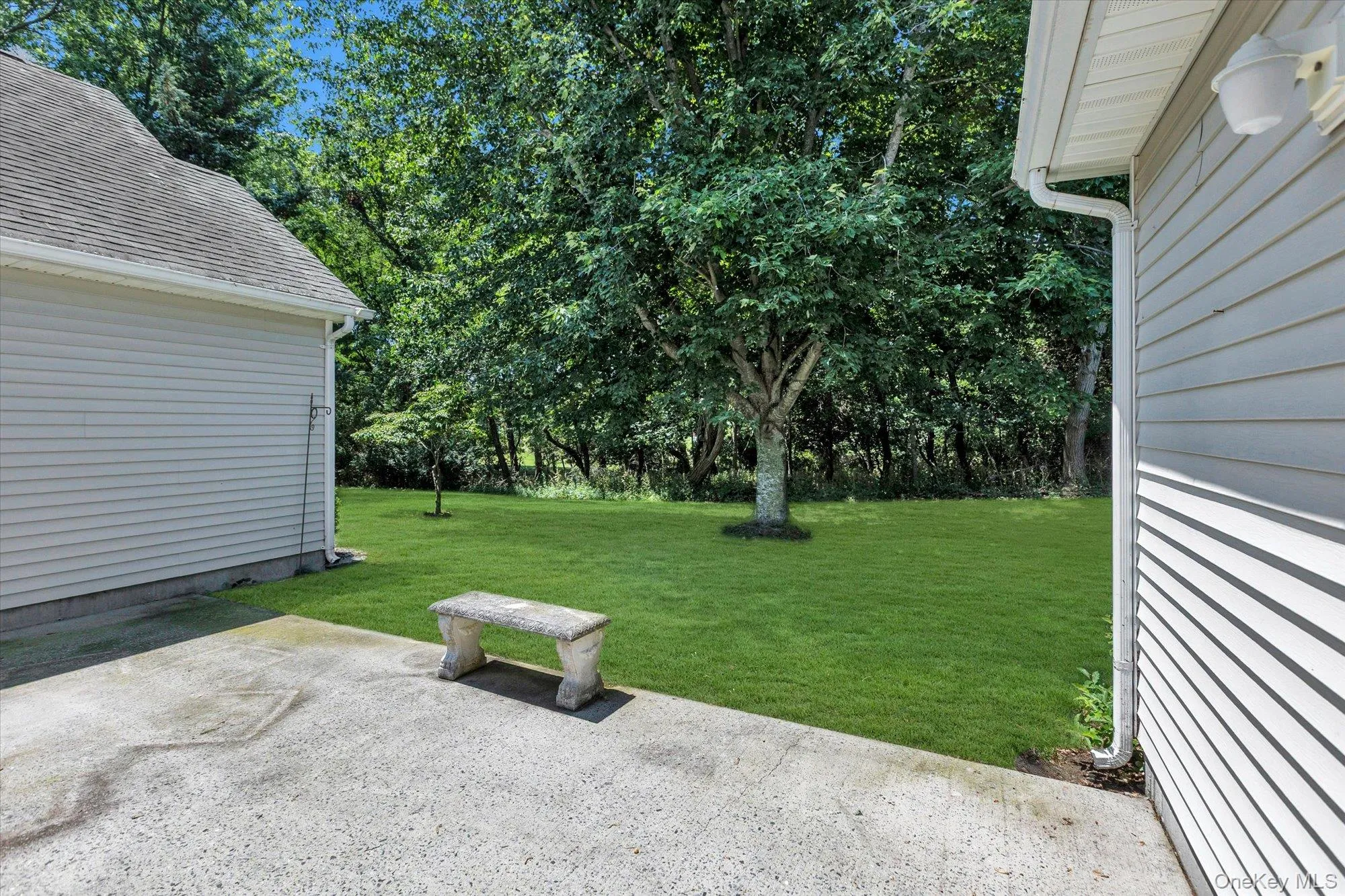 Back Patio and Yard. Back Patio and Yard.