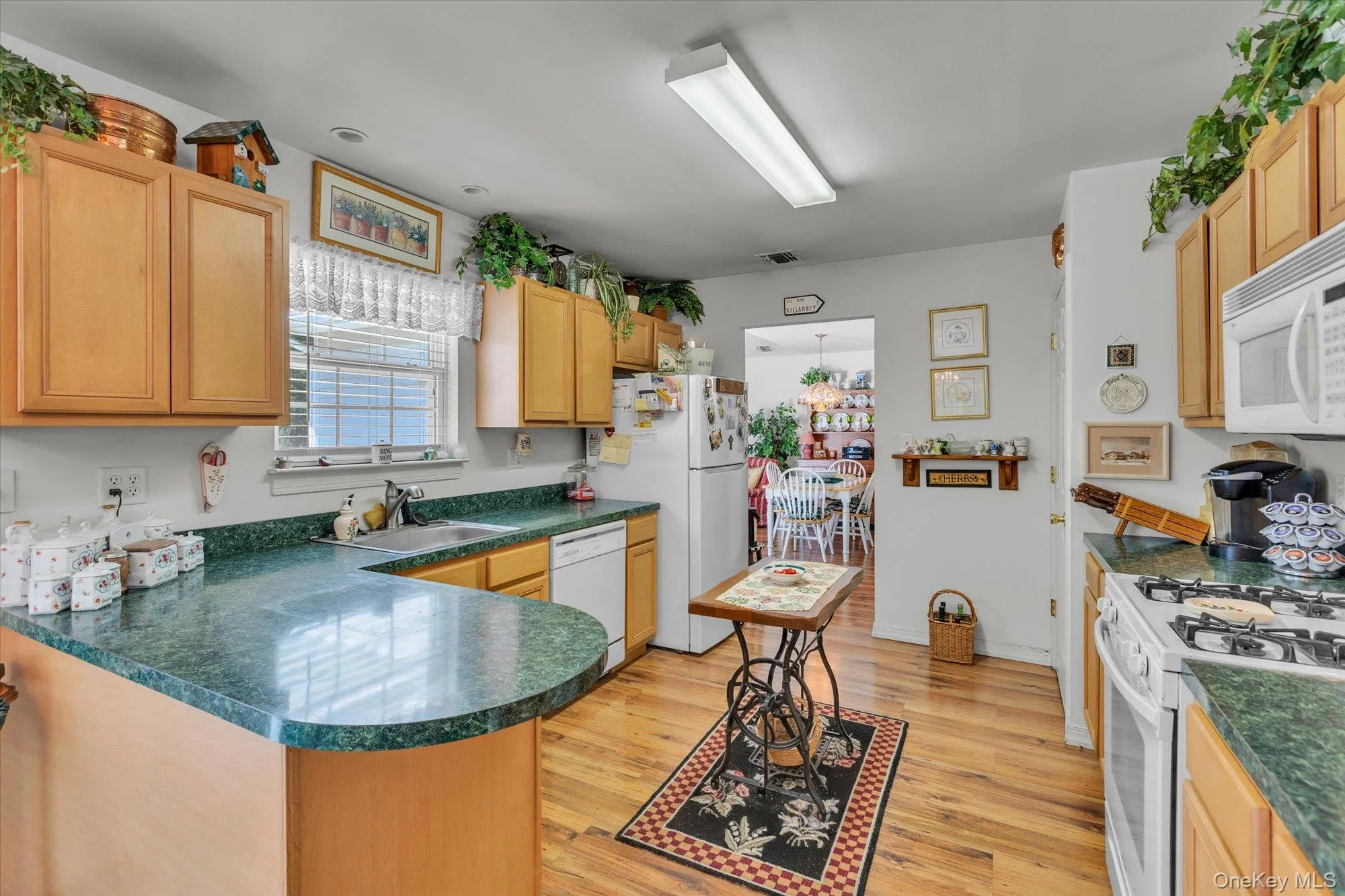 Kitchen with access to family room. Kitchen with access to family room.