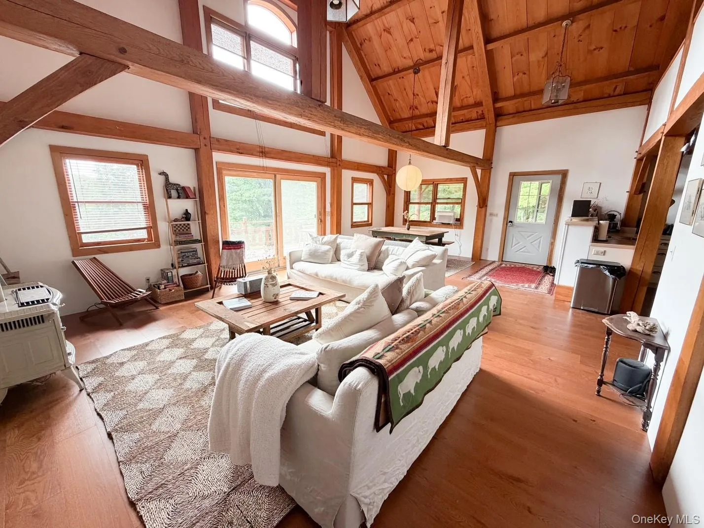 Vaulted wood-finish ceilings featuring exposed beams Vaulted wood-finish ceilings featuring exposed beams