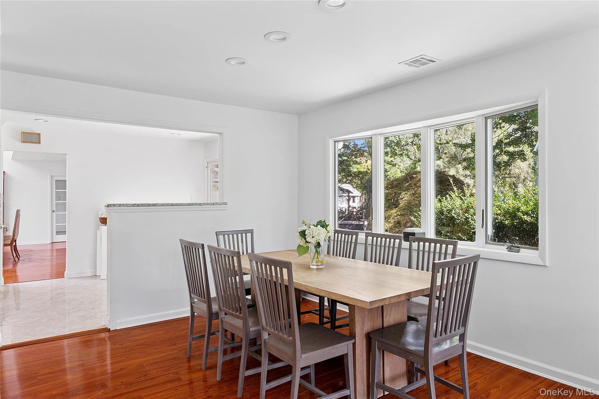 Breakfast table open to kitchen and living room Breakfast table open to kitchen and living room