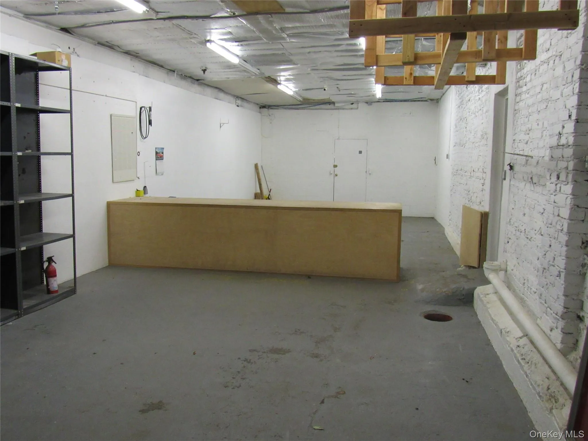 Garage bay 54 ft depth counter can be removed Garage bay 54 ft depth counter can be removed