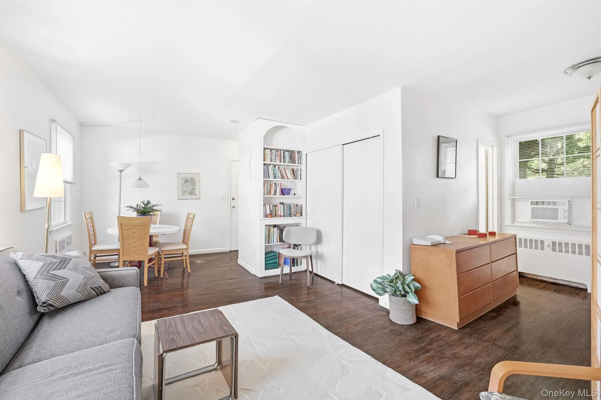There are well-maintained dark-stained wood floors throughout this distinctive studio apartment There are well-maintained dark-stained wood floors throughout this distinctive studio apartment