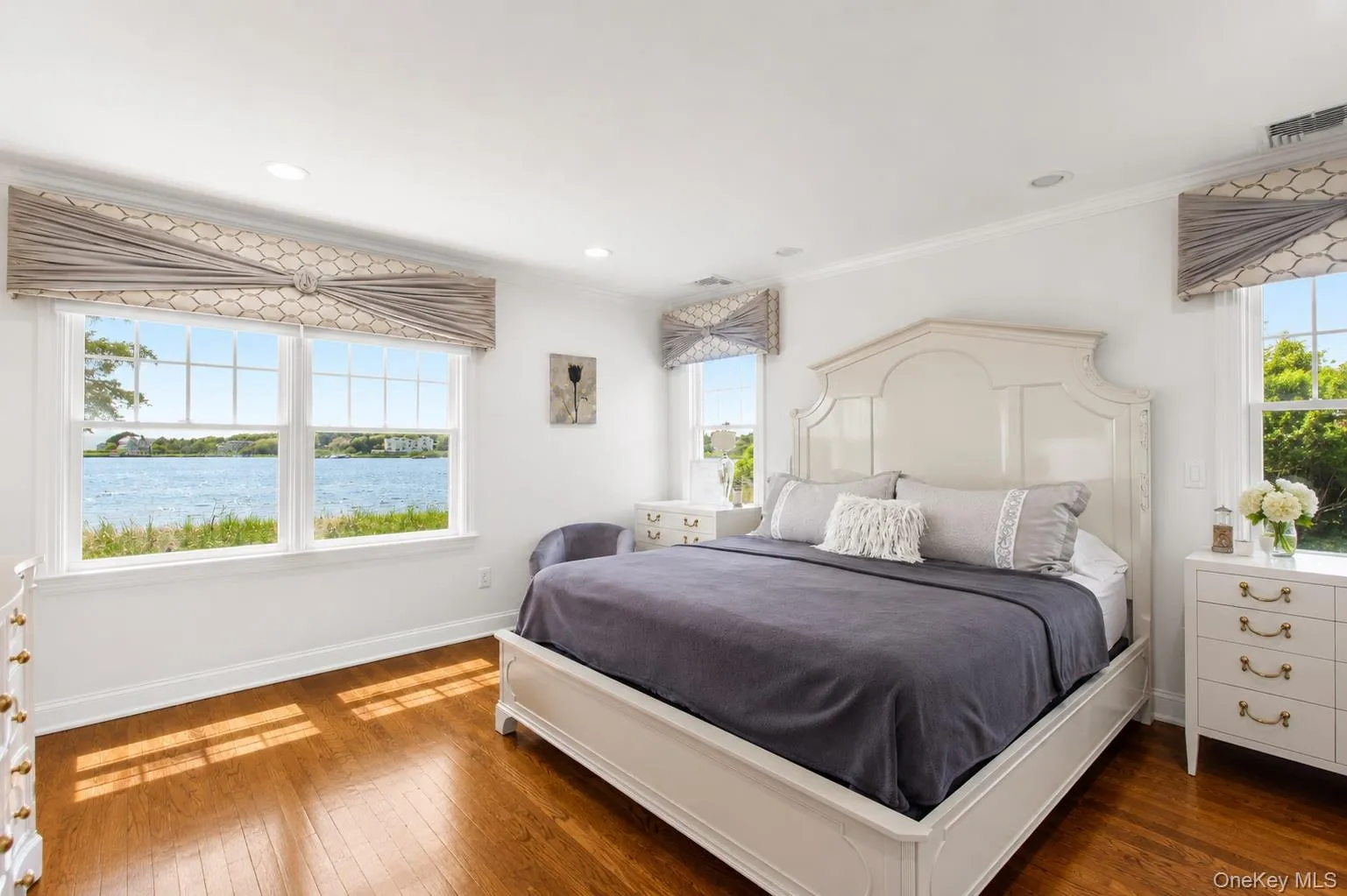 Primary Bedroom with water views Primary Bedroom with water views