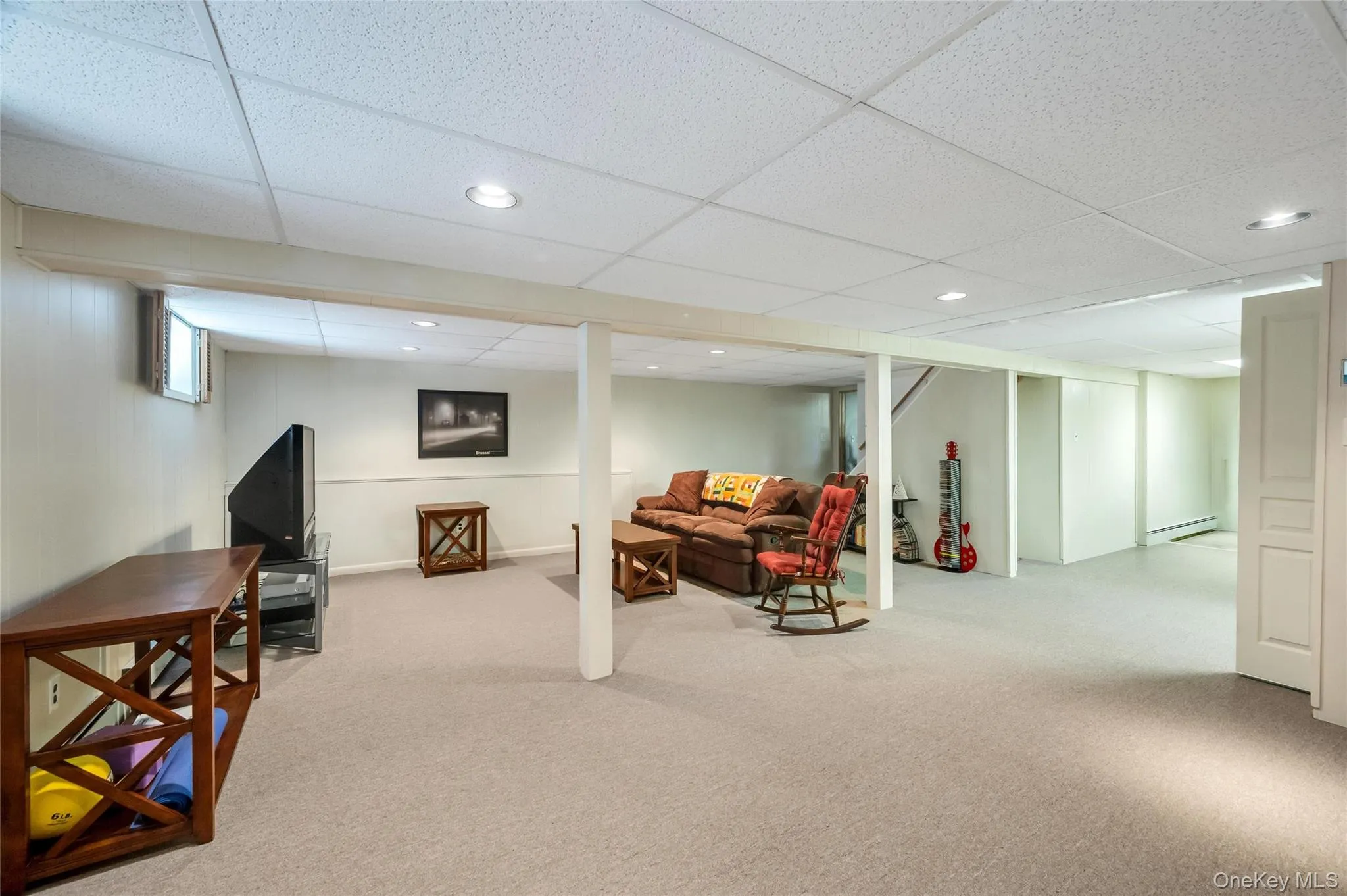 Large Family room with wall to wall carpeting Large Family room with wall to wall carpeting