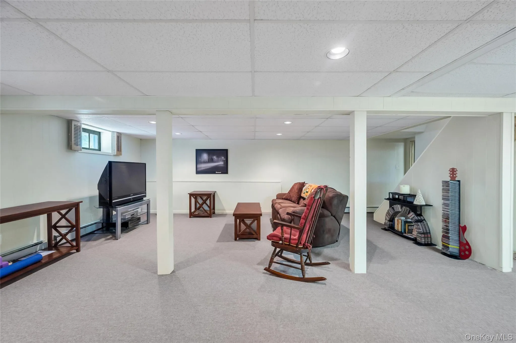 Large Family Room with wall to wall carpeting Large Family Room with wall to wall carpeting