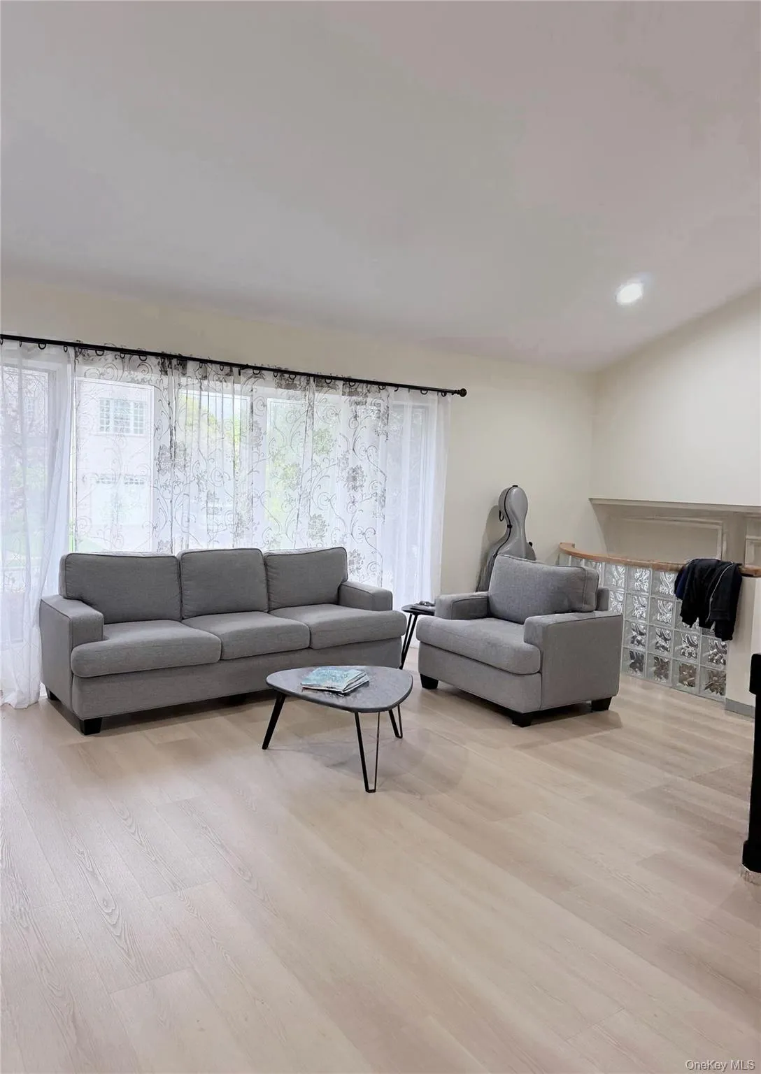 Light wood-finish flooring extending throughout the space Light wood-finish flooring extending throughout the space