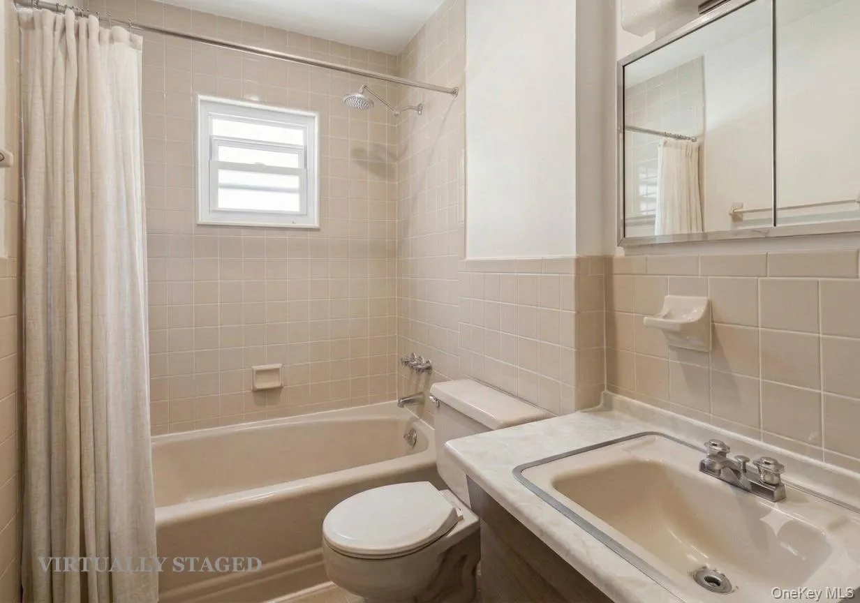 Full Bathroom - virtually staged to show empty Full Bathroom - virtually staged to show empty
